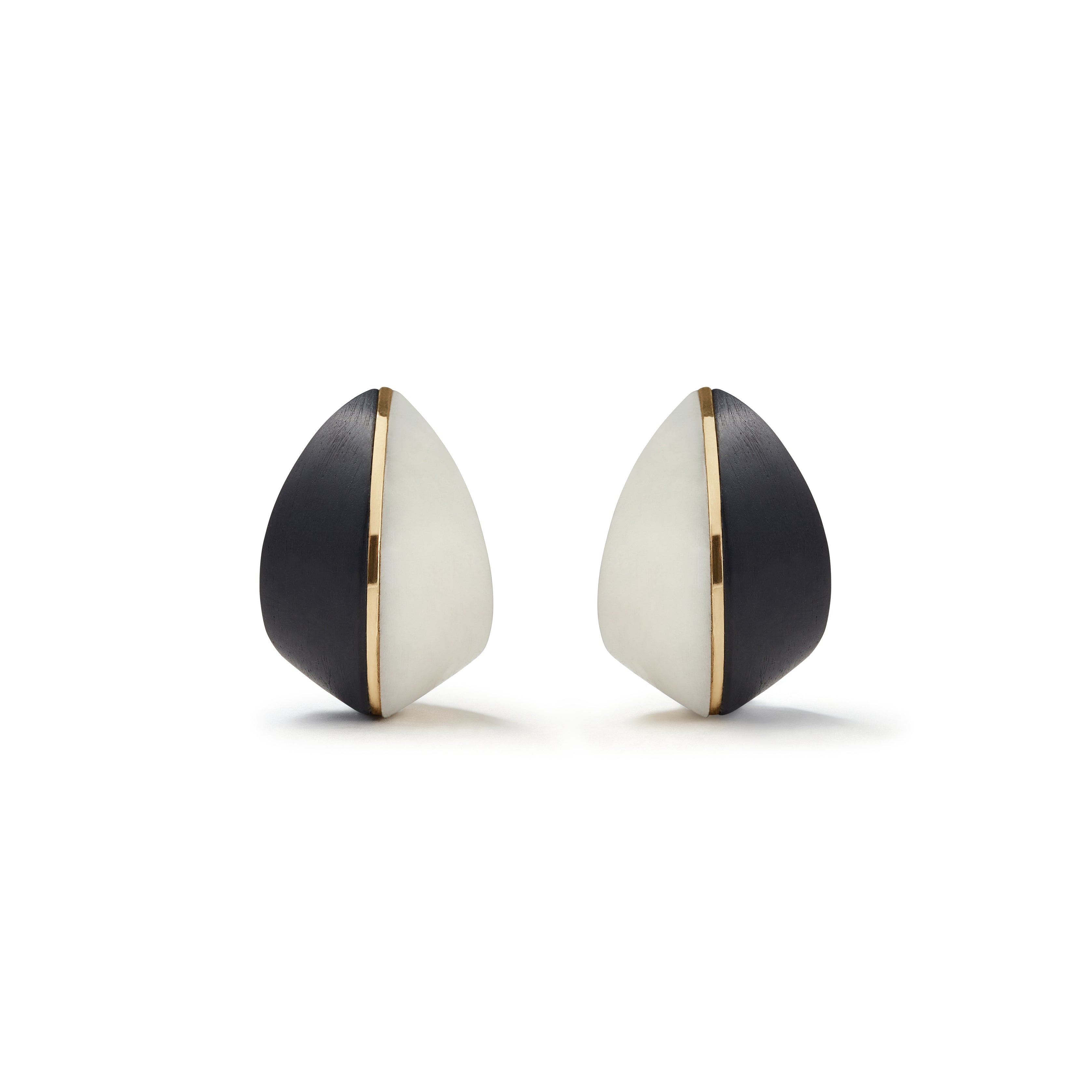 18k yellow gold sculptural black ebony wood and white tagua seed nut armour stud earrings by Fernando Jorge Tiny Gods