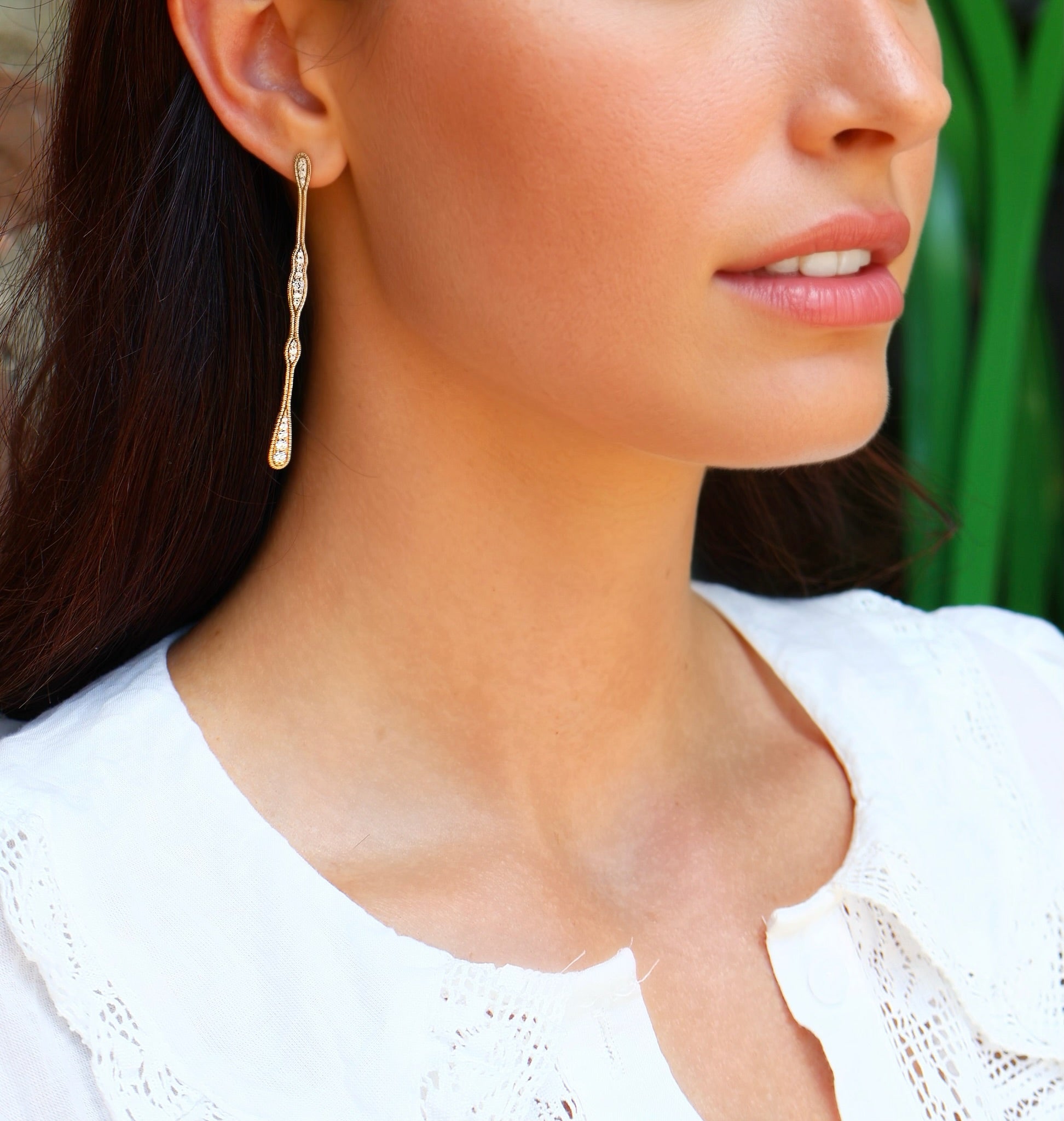 18k yellow gold diamond long fluid drop earrings by Fernando Jorge Tiny Gods