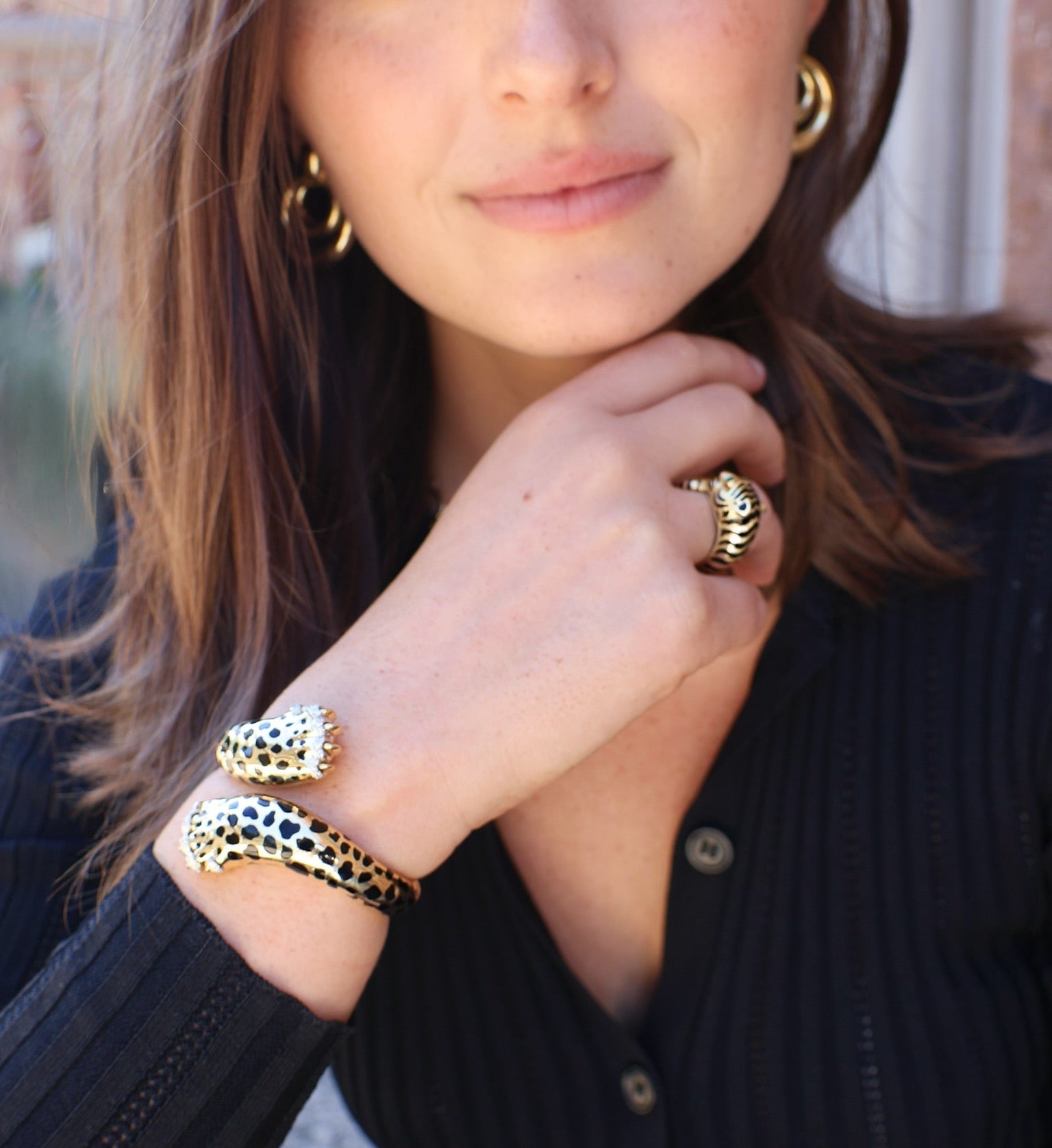 18k yellow gold looped tail leopard ring with black enamel spots and emerald cabochon eyes by David Webb Tiny Gods