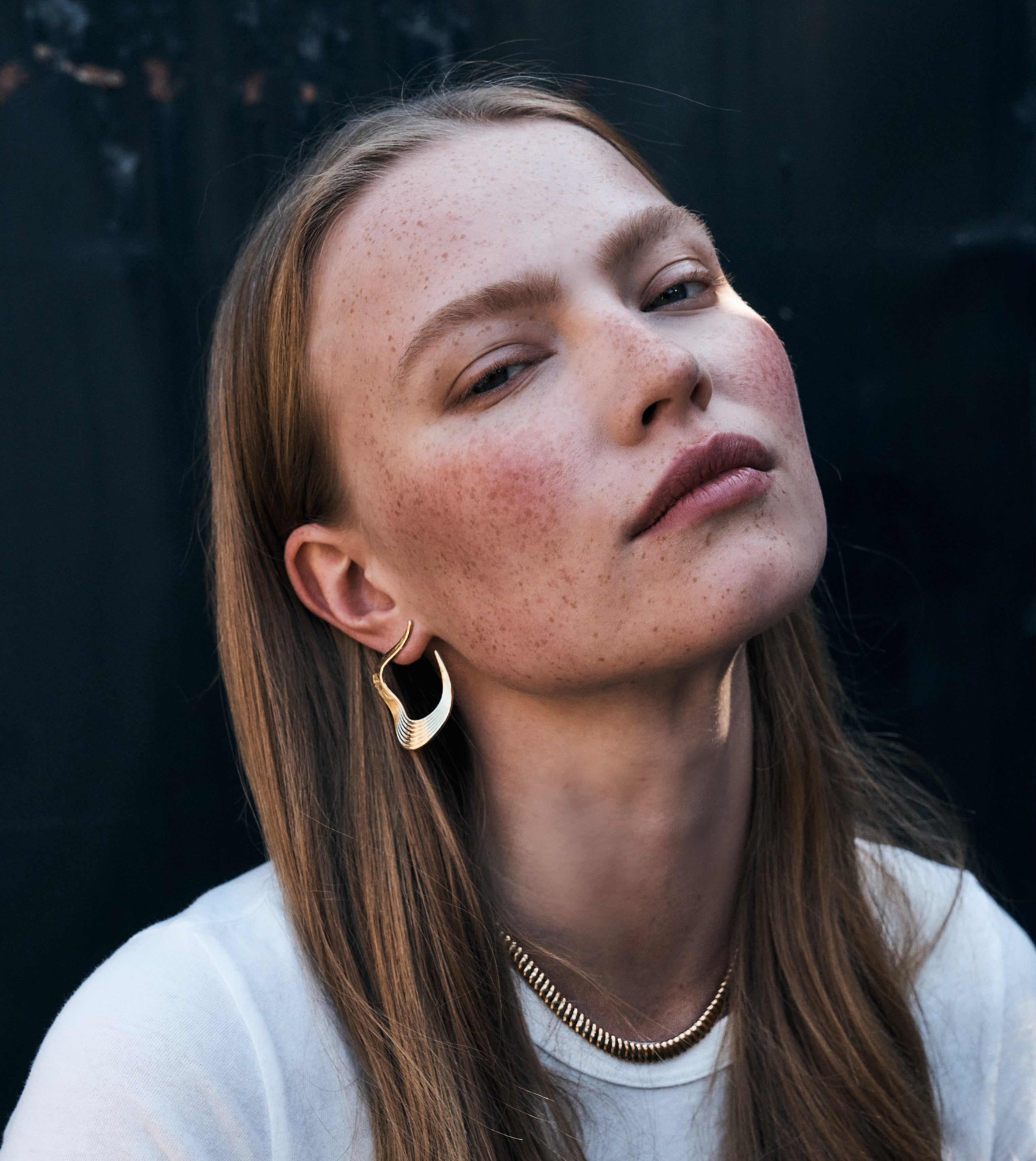 18k yellow gold open stream line hoop earrings by Fernando Jorge Tiny Gods