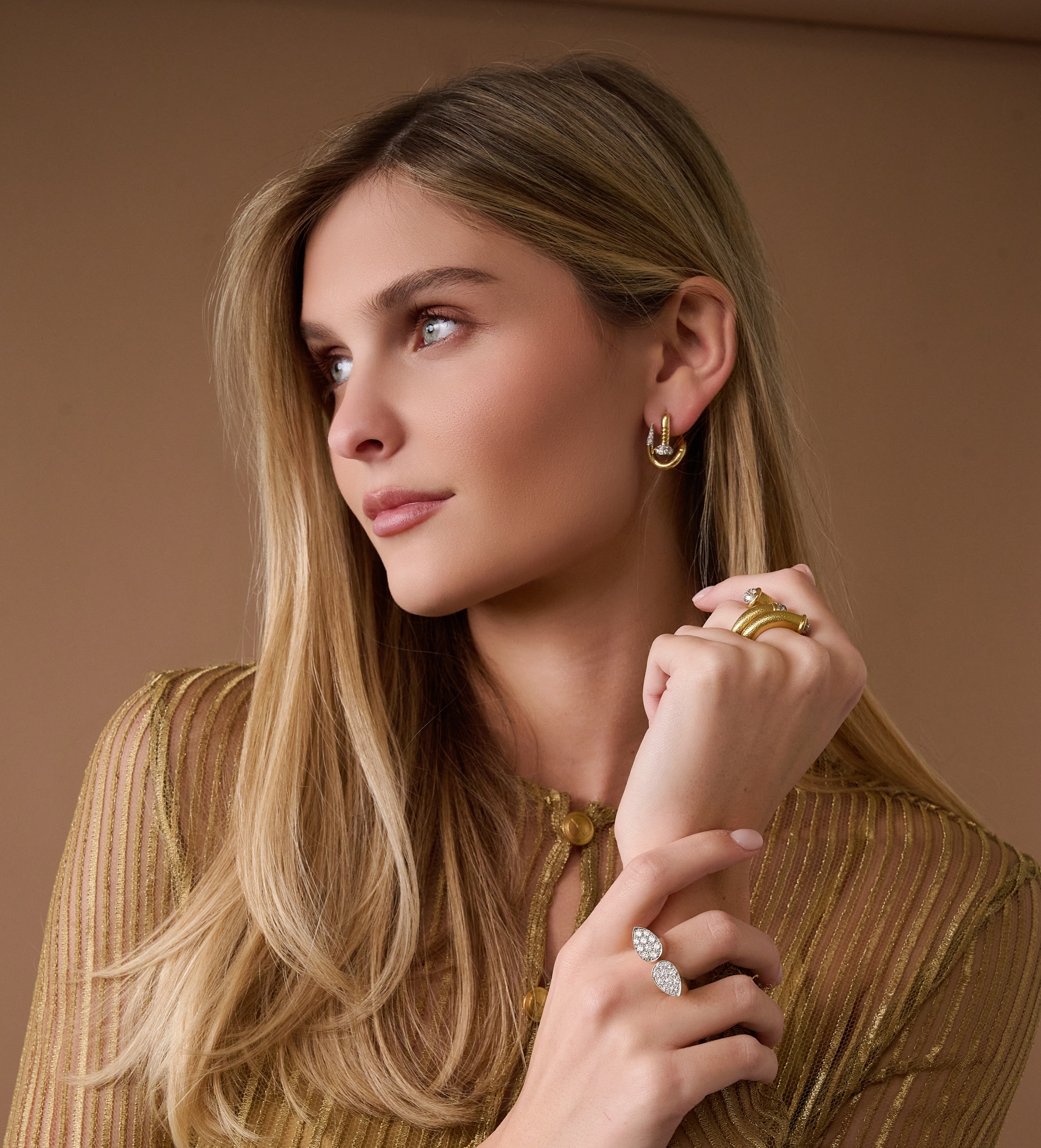 18k yellow gold and platinum diamond bent nail earrings by David Webb Tiny Gods on model