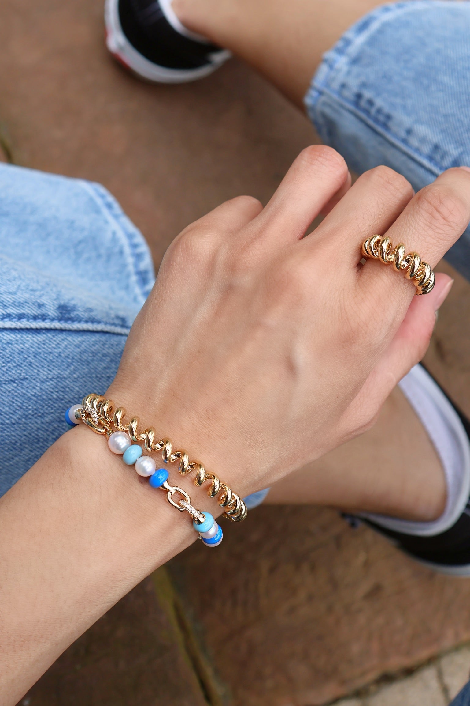 18k yellow gold slinkee bangle bracelet by Boochier Tiny Gods