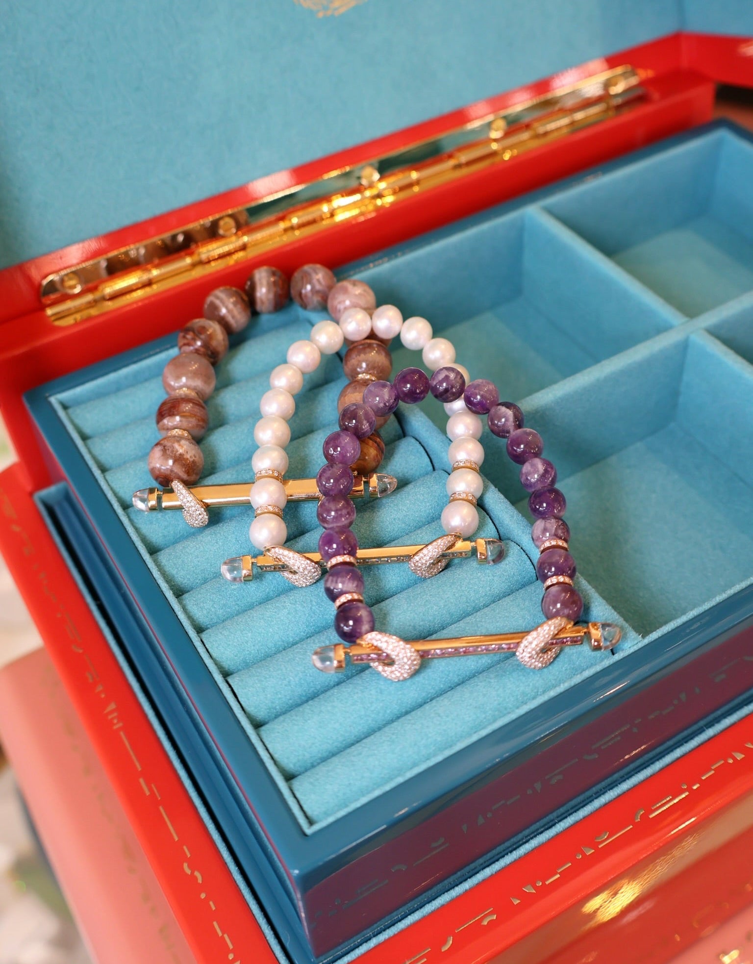 18k yellow gold white pearl beaded chakra bracelet on titanium coil stretch aquamarine bar and diamond loop bracelet by Ananya Tiny Gods