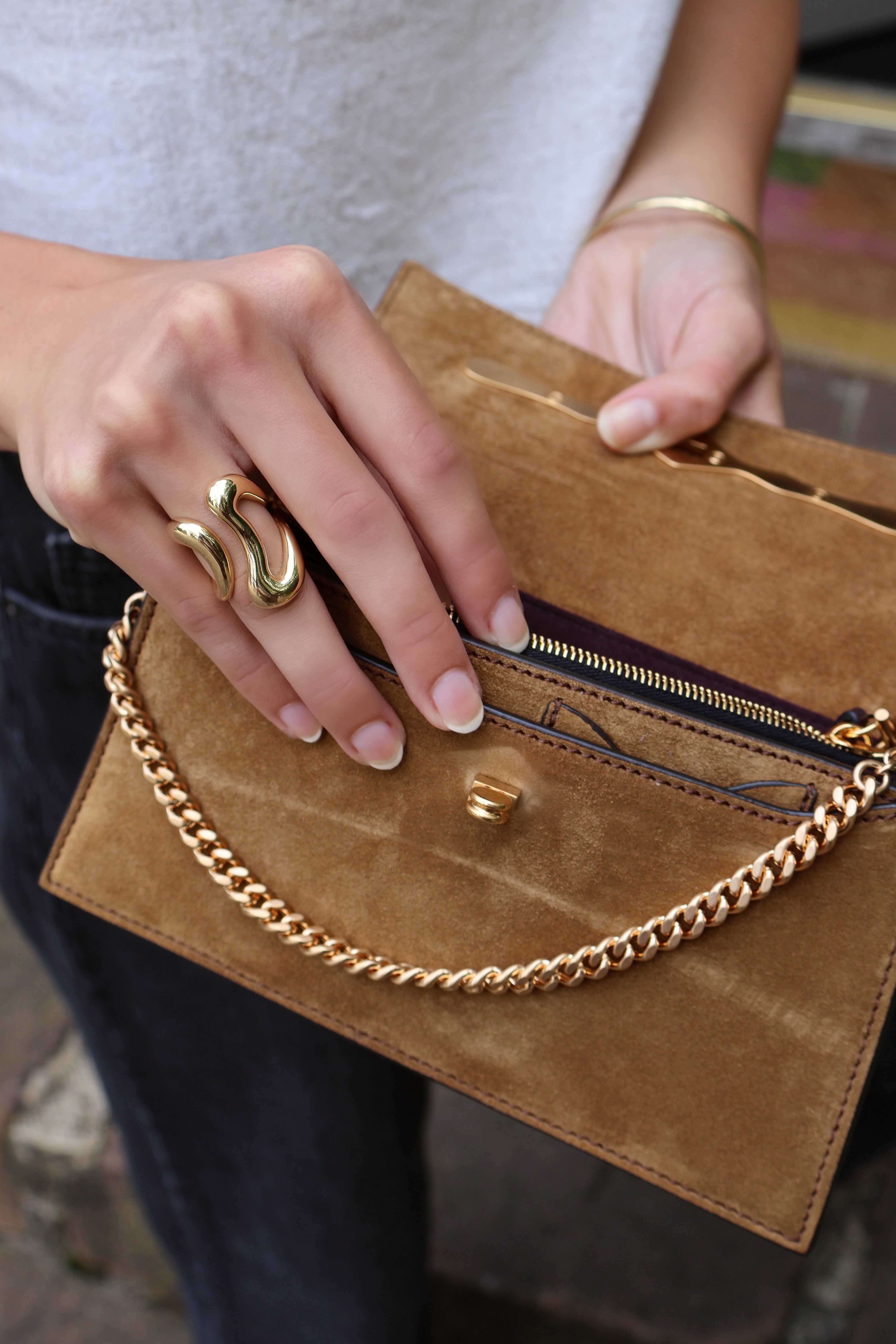 18k yellow gold bold stream open ring by Fernando Jorge Tiny Gods on model