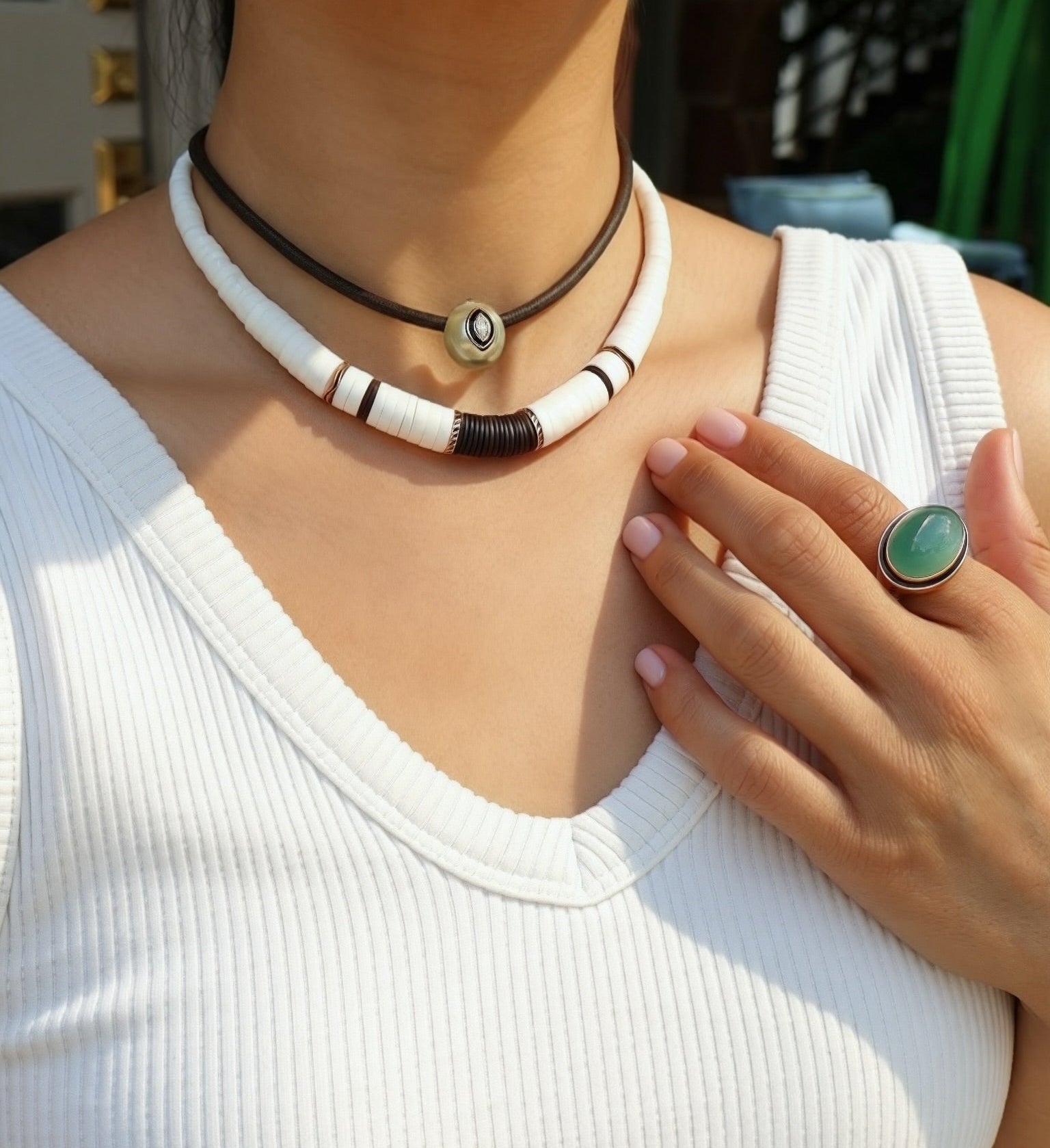 dezso white shell fin brown puke necklace tiny gods