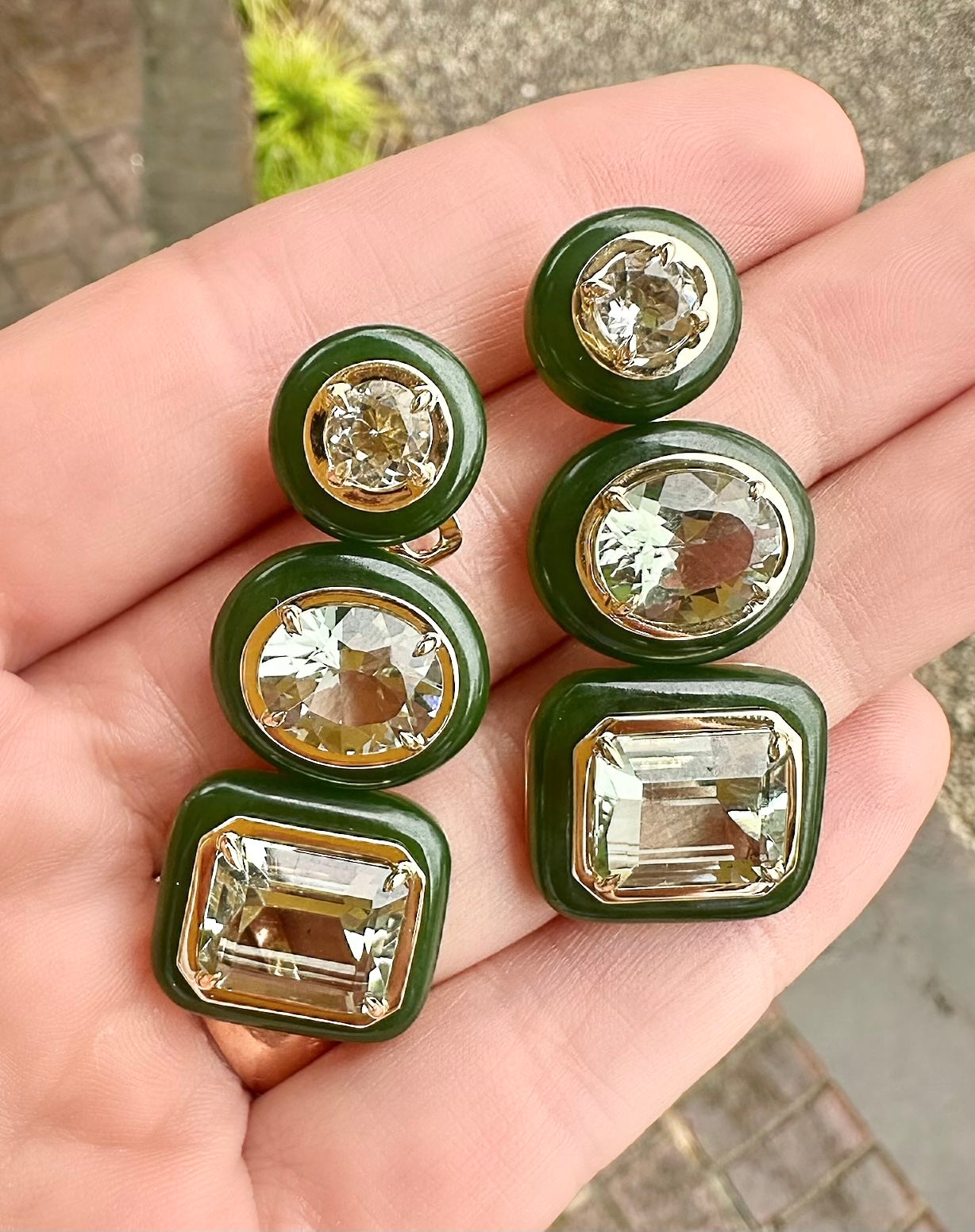 Sauer 18k yellow gold Igapo earrings with tourmaline and prasiolite surrounded by smooth jade in a circle, oval and square shape. The semi-precious stones are bezel set and have a post back.
