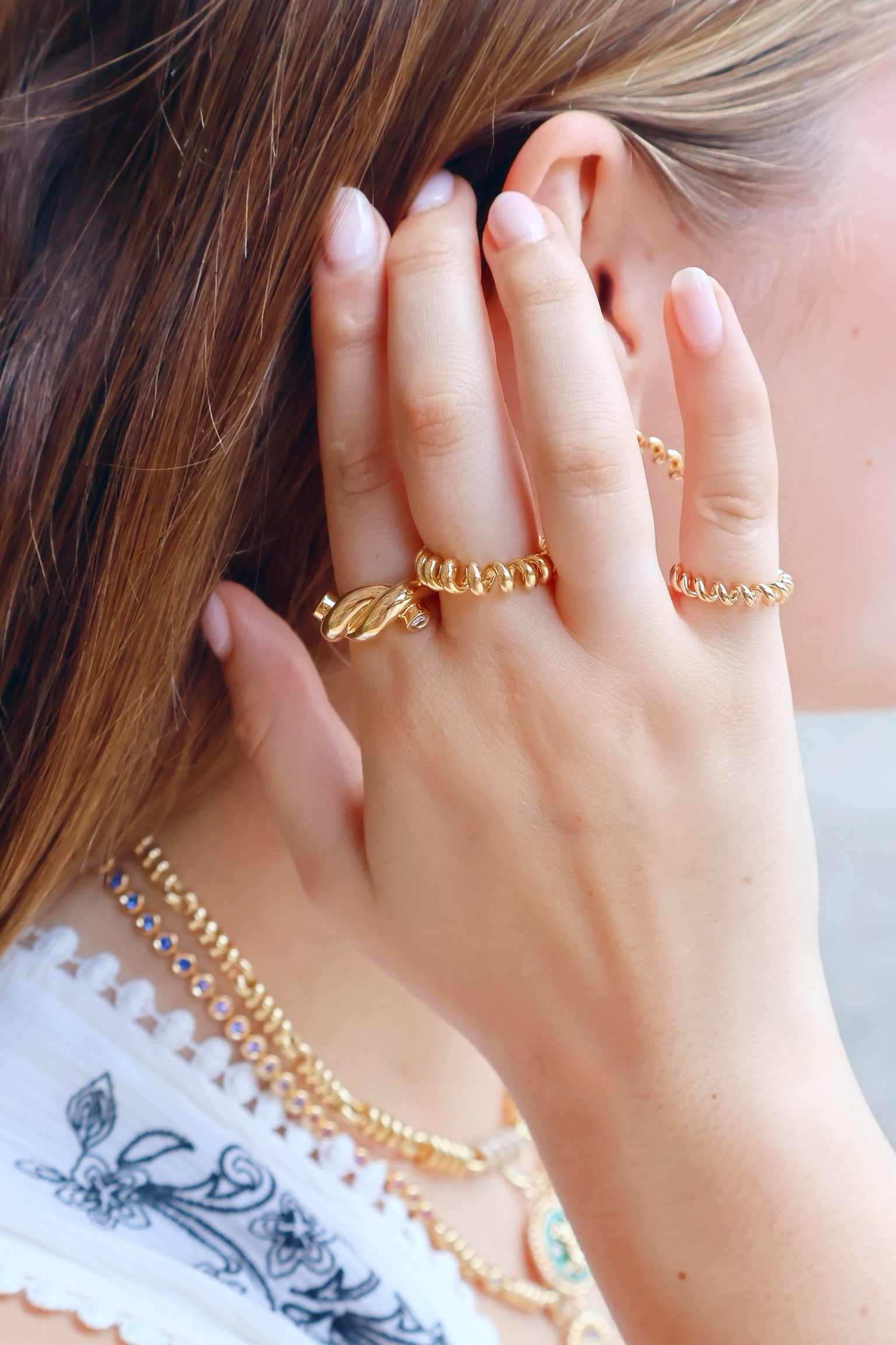 18k yellow gold mini slinkee ring by Boochier Tiny Gods