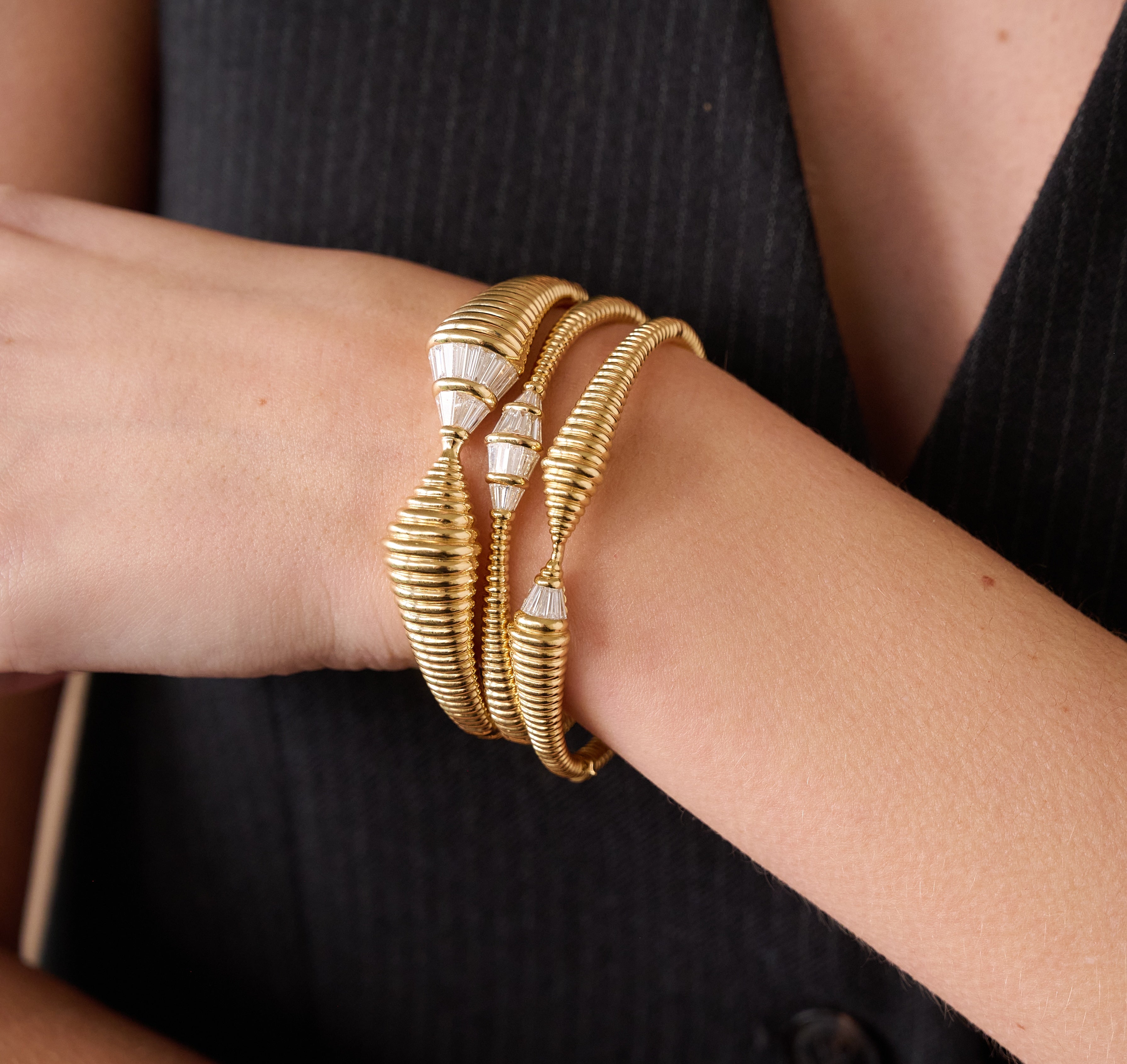 18k yellow gold diamond baguette Nikos Koulis Spectrum bangle bracelet tiny gods on model