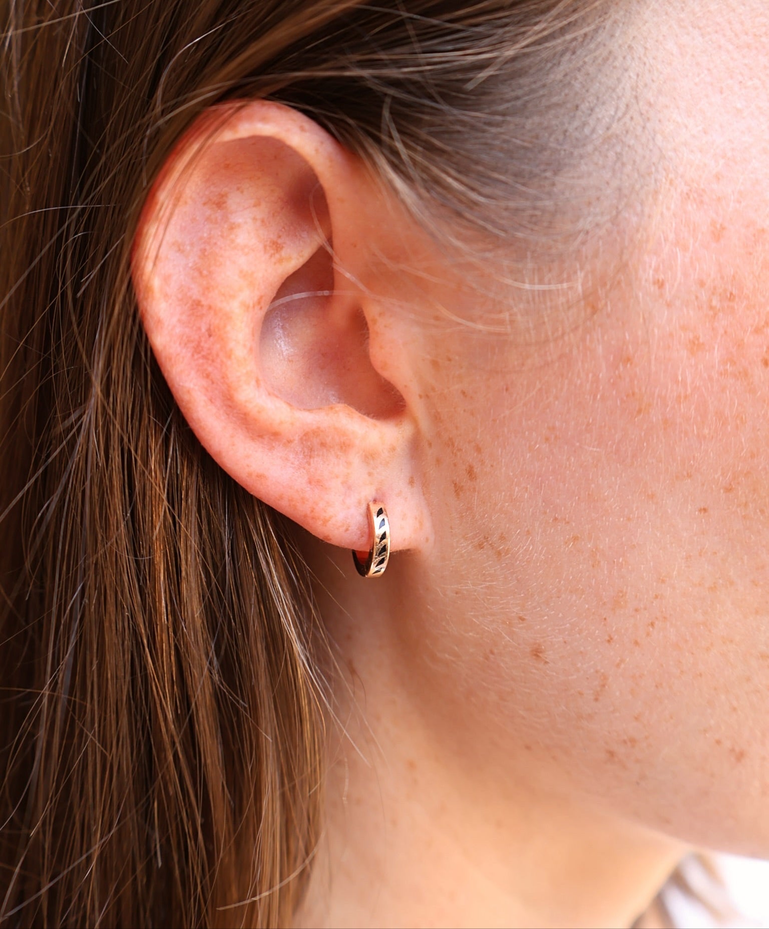 18k rose gold black enamel shark fin huggie hoop earrings by Dezso Tiny Gods