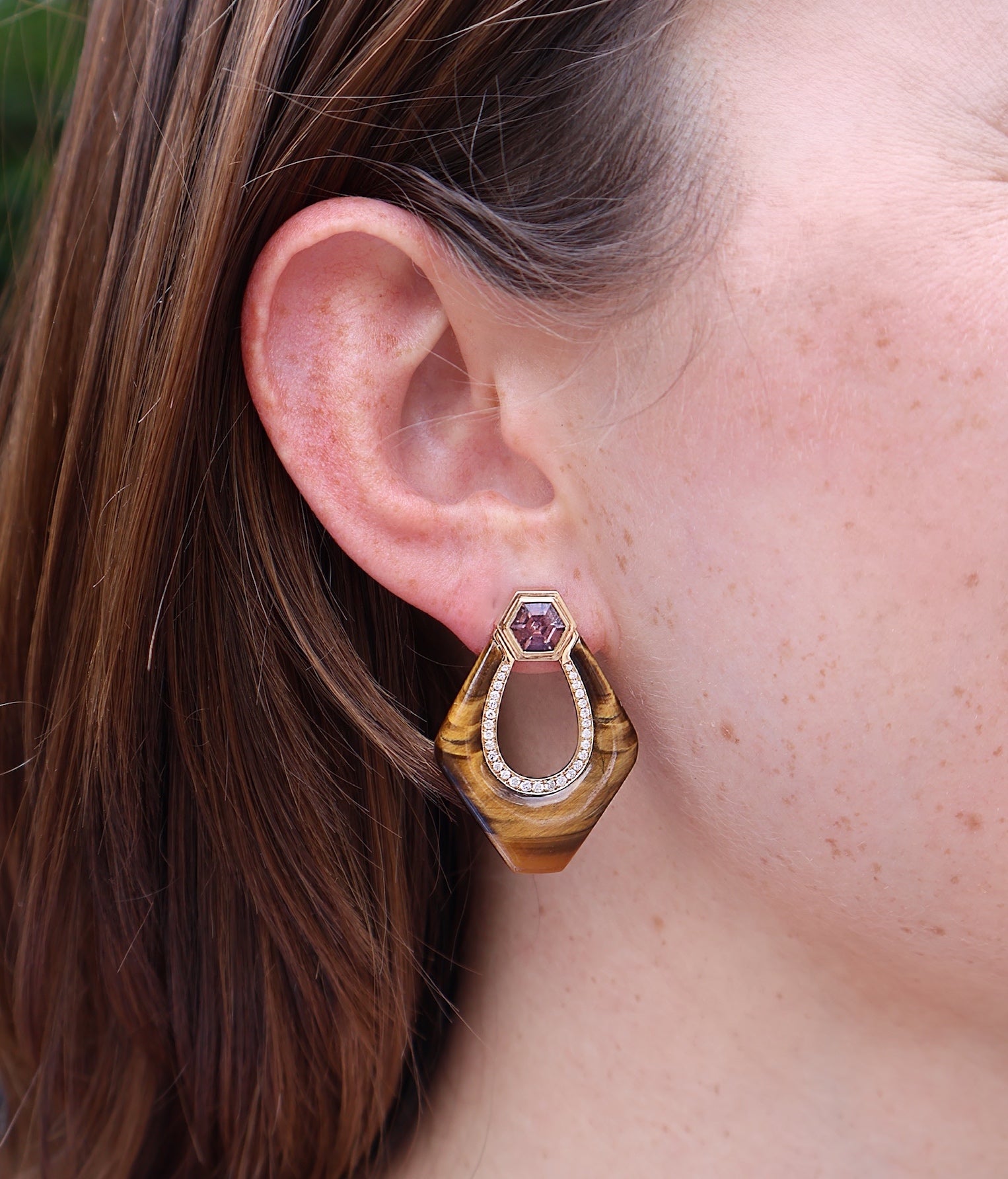 18k yellow gold tigers eye nomad doorknocker earrings with pink spinel and diamonds by Sorellina Tiny Gods on model