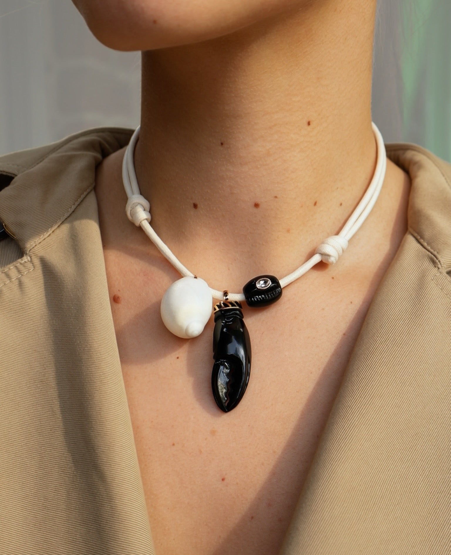18k rose gold black onyx lobster claw white shell and black diamond cowry bead charm pendant necklace styled look by Dezso Tiny Gods