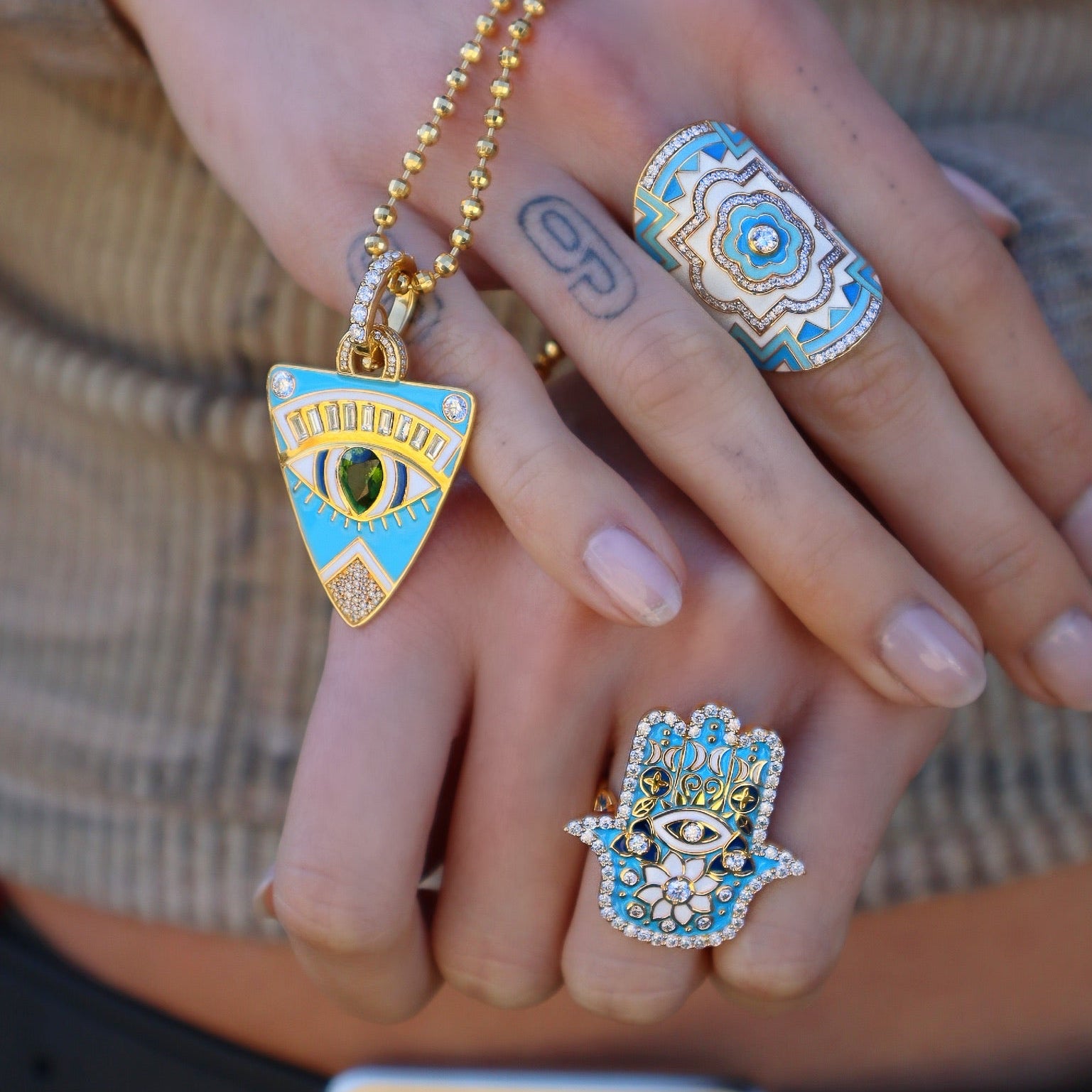 20k yellow gold sky blue, navy blue and white enamel hamsa ring with diamonds by Buddha Mama Tiny Gods