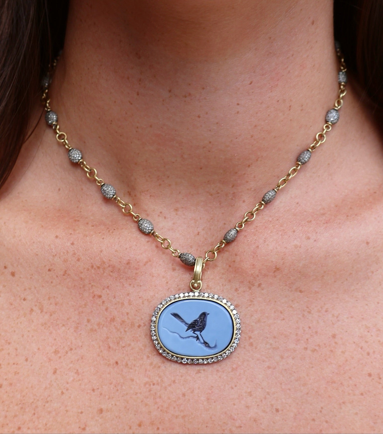 18k yellow gold bird intaglio onyx carved charm pendant with diamond border by Sylva & Cie Tiny Gods
