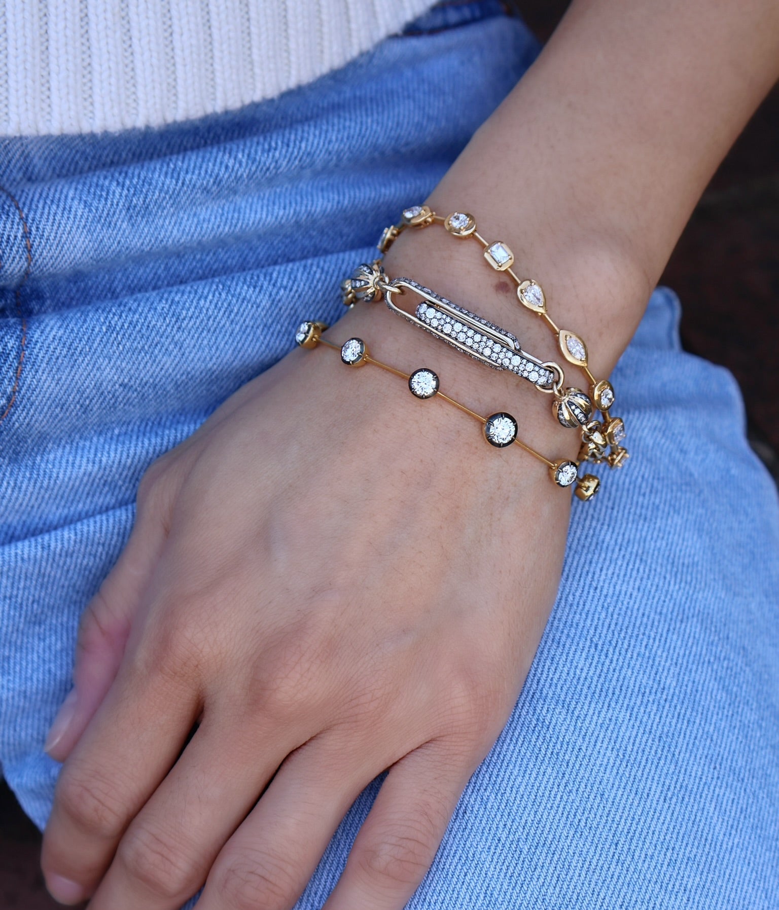 18k yellow gold round brilliant GIA certified varying size diamond bezel set bracelet on wire with black rhodium plating Tiny Gods