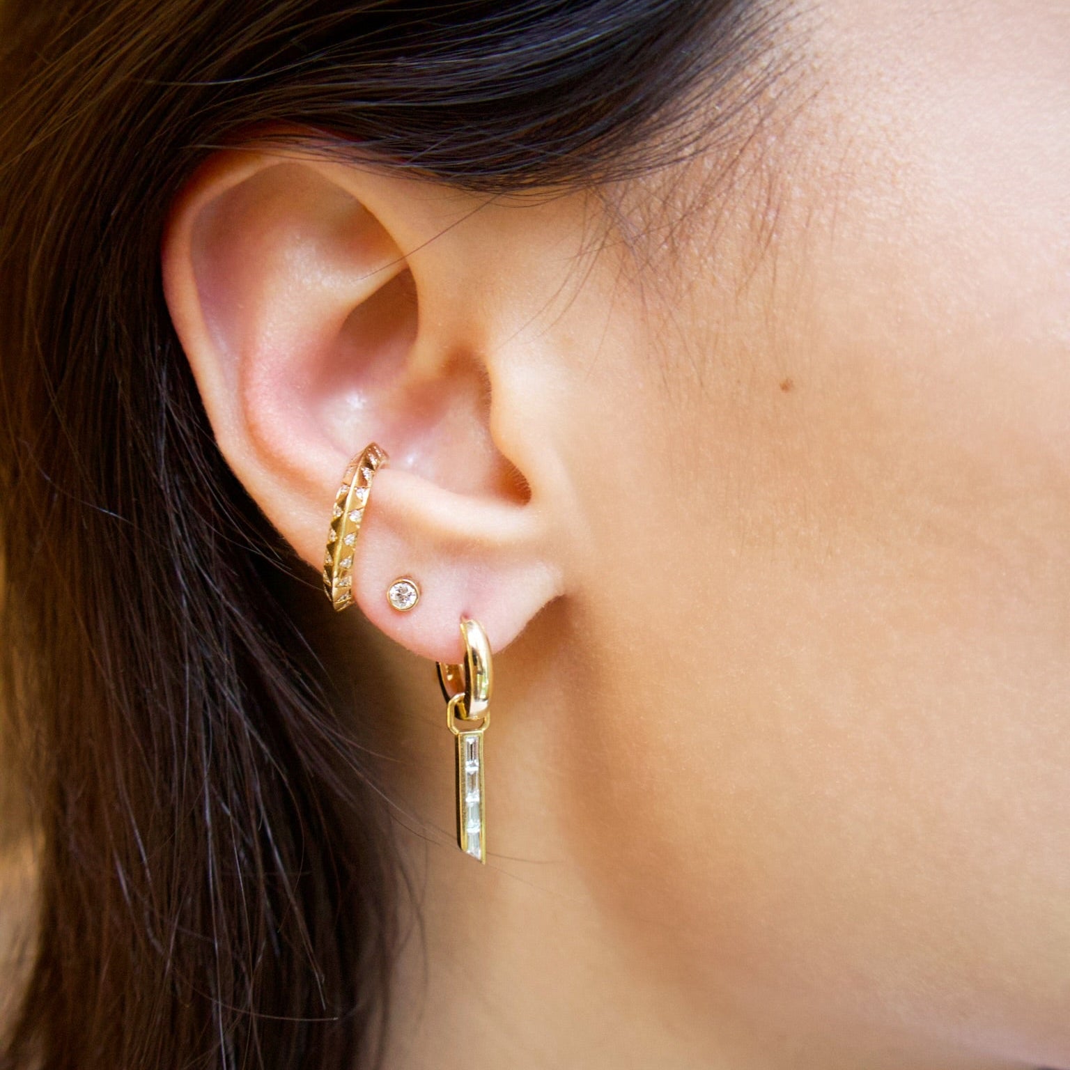 18k yellow gold white diamond baguette small huggie oblong hoops with removable diamond chevron charm earrings by Tomasz Donocik Tiny Gods