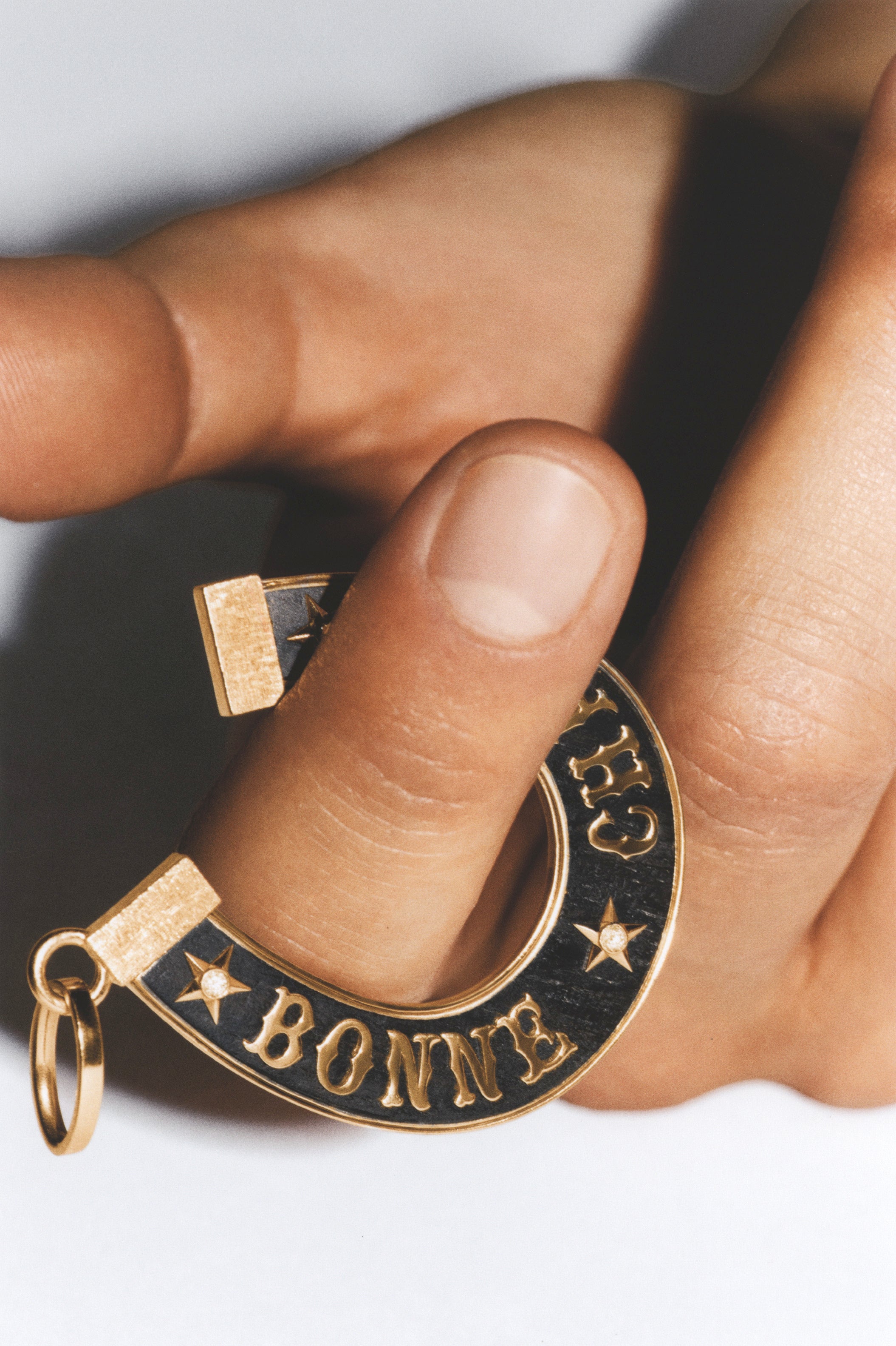 18k yellow gold black ebony wood Bonne Chance horseshoe lucky pendant good luck charm by Marie Lichtenberg Tiny Gods