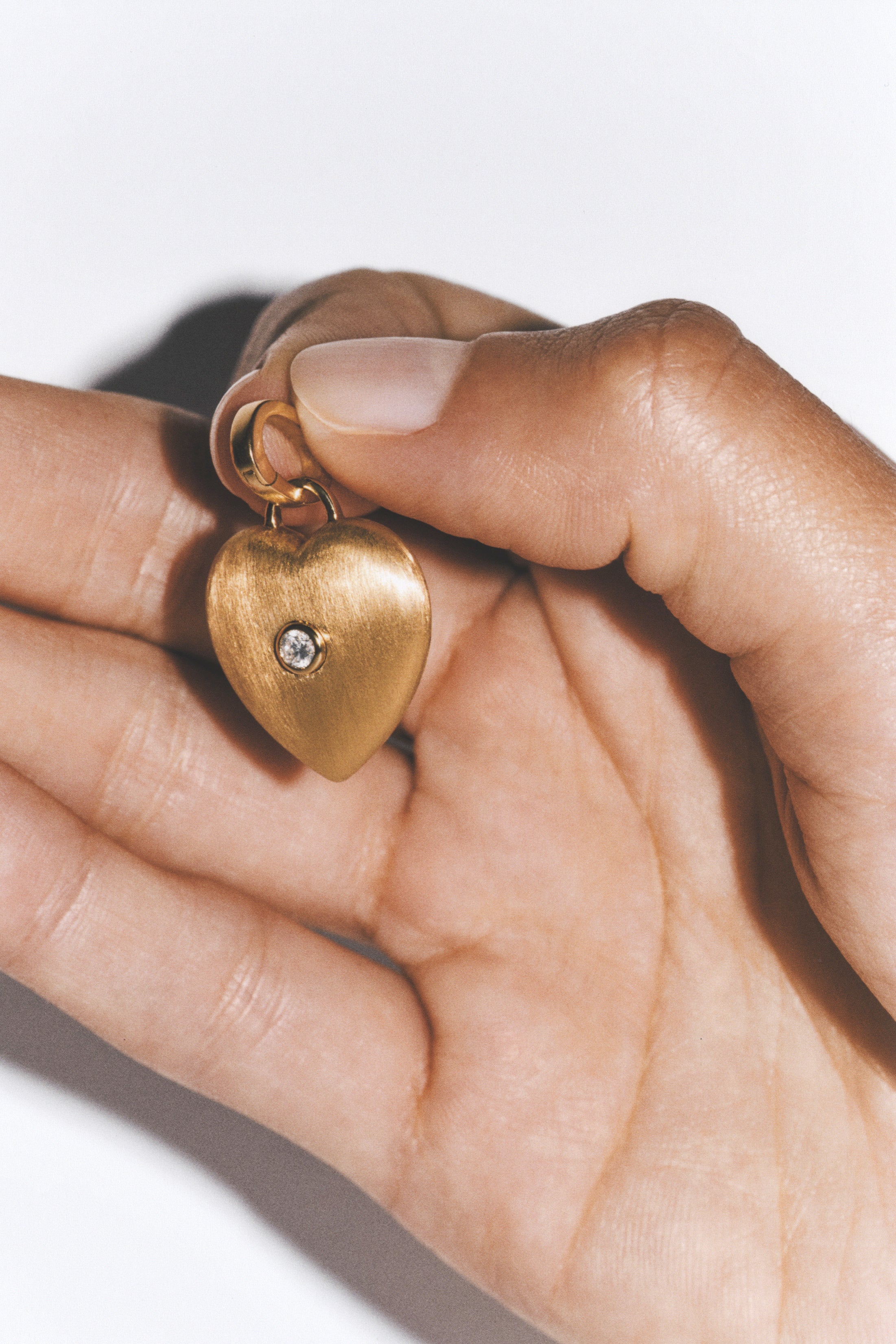 18k yellow gold diamond domed heart pendant charm earring by Marie Lichtenberg Tiny Gods