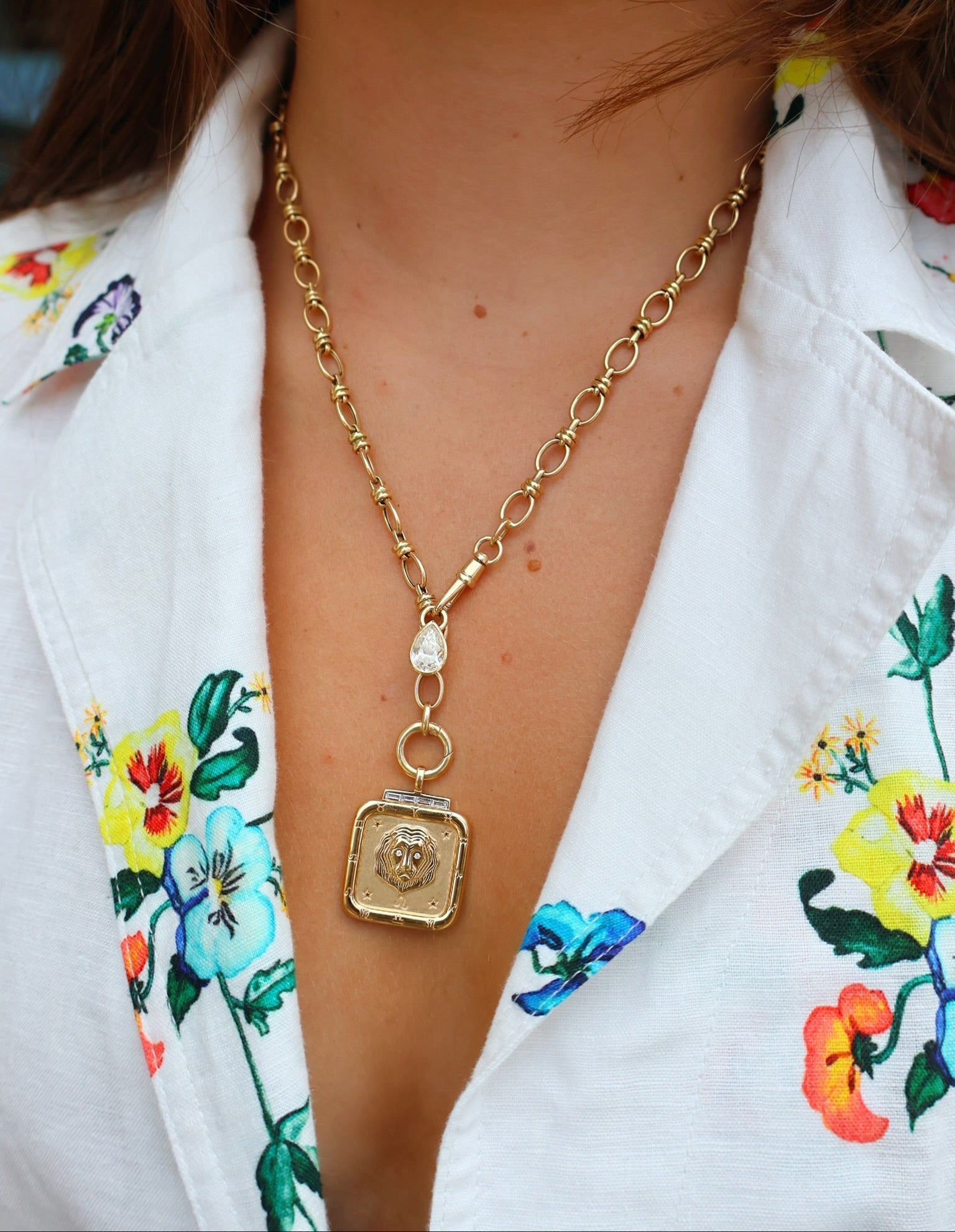 18k yellow gold and diamond zodiac Leo pendant by Sorellina Tiny Gods
