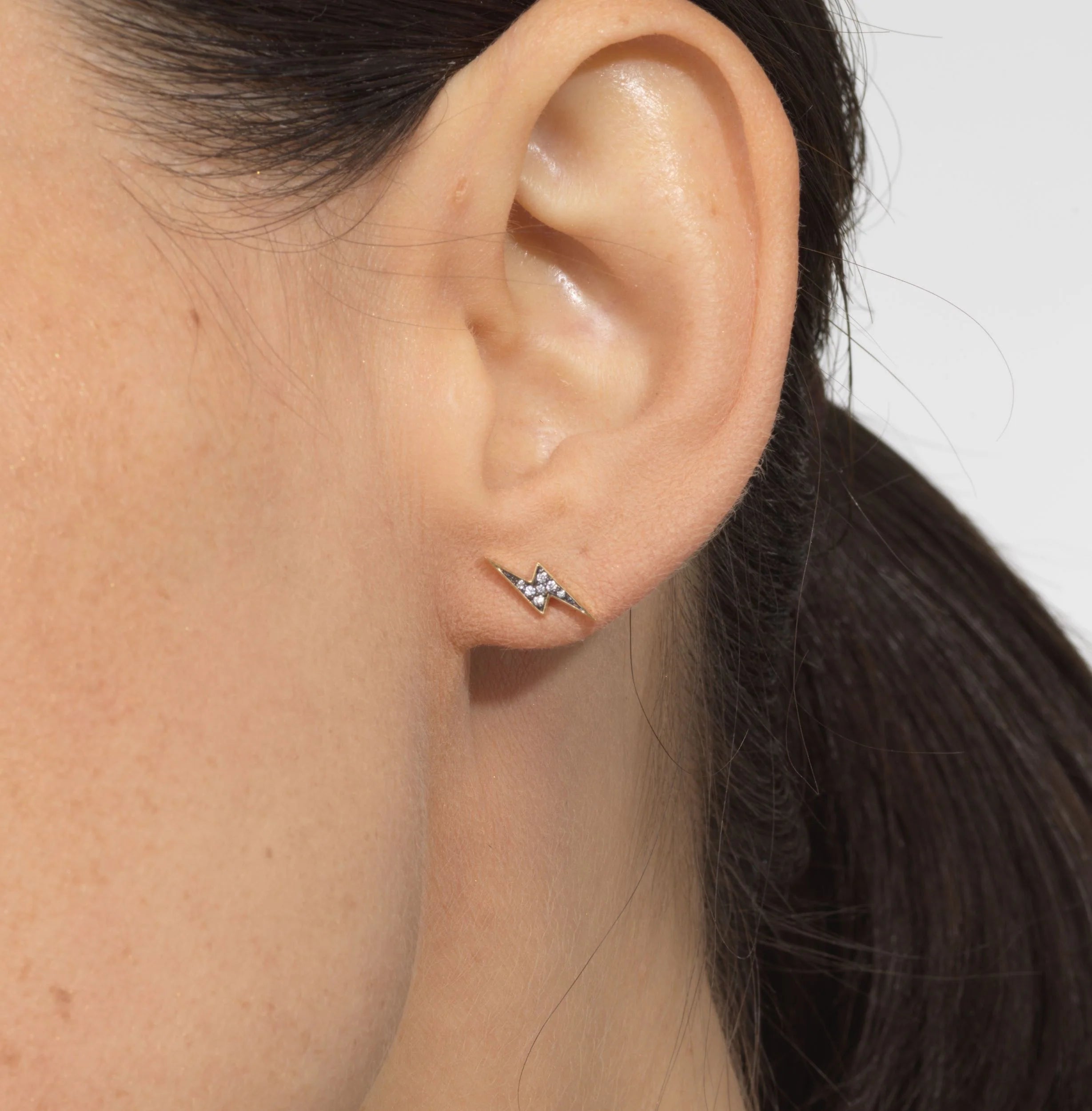 18k yellow gold lightning bolt earrings by diamonds and black rhodium detail by Sorellina Tiny Gods