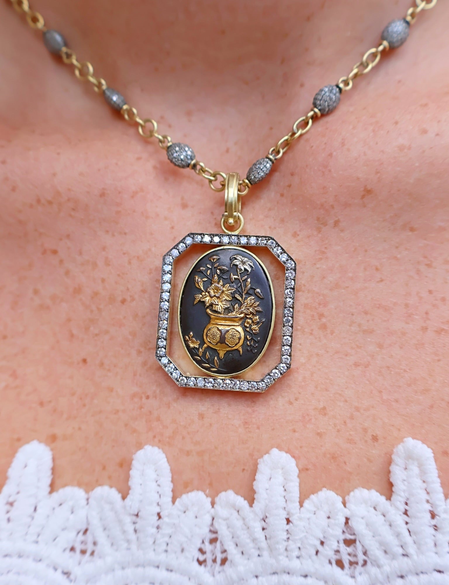 18k yellow gold diamond pendant with 1870's shakudo Japanese samurai sword with gold flower pot and floral motif by Sylva & Cie Tiny Gods
