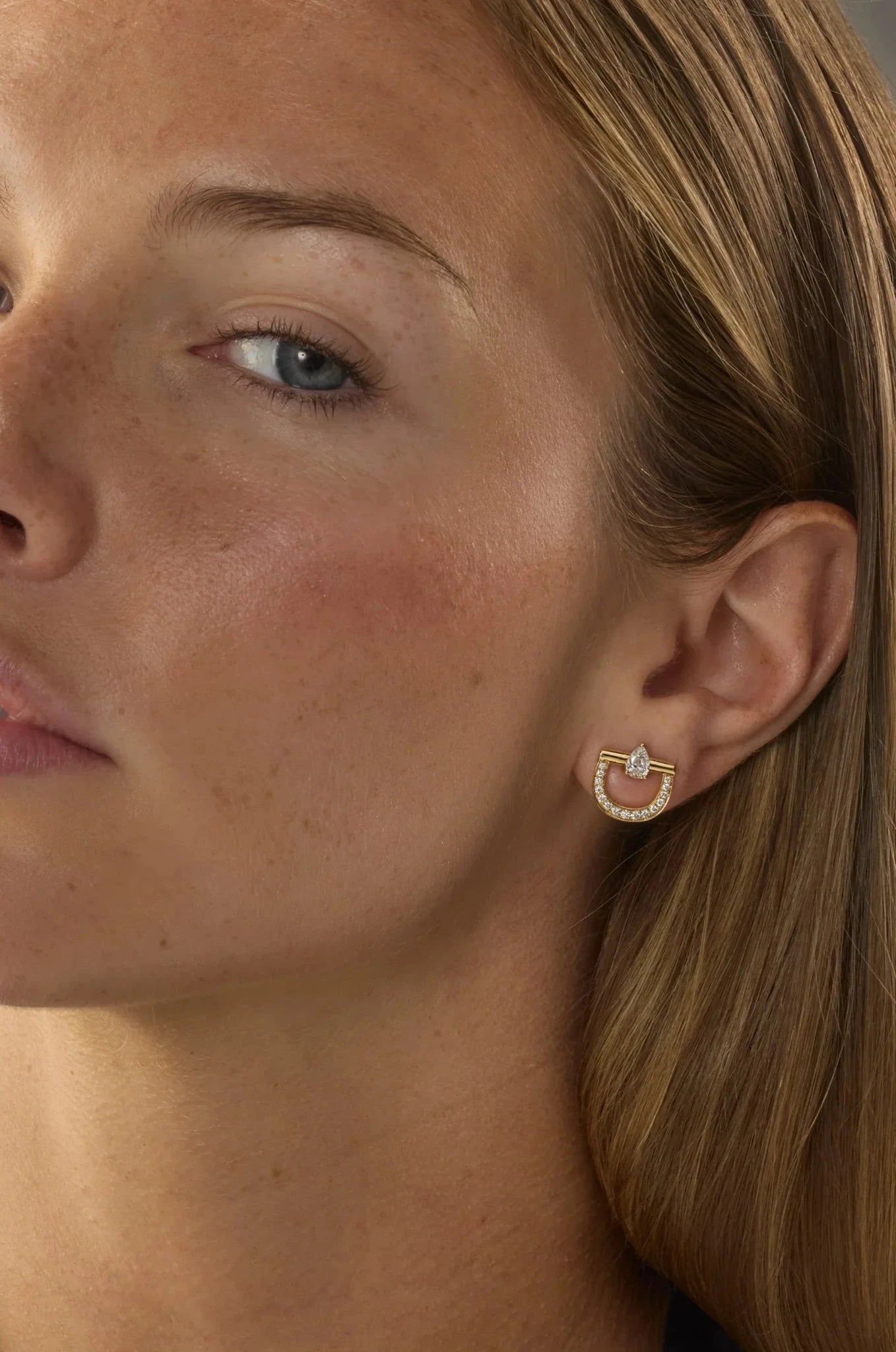 18k yellow gold diamond pear stirrup earrings by Graziela Tiny Gods