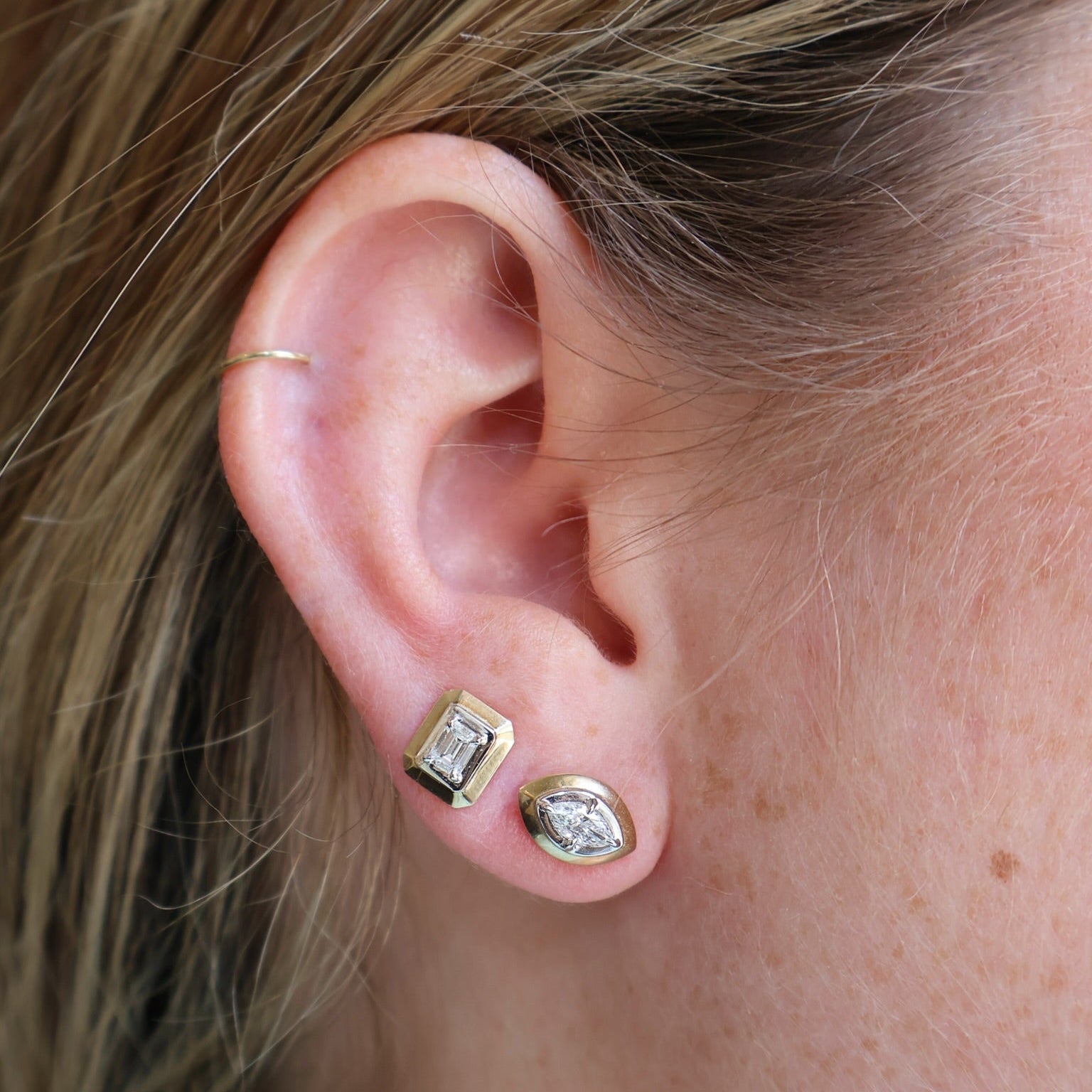 9k yellow gold and white rhodium emerlad cut diamond tribal stud earring by Rainbow K Tiny gods