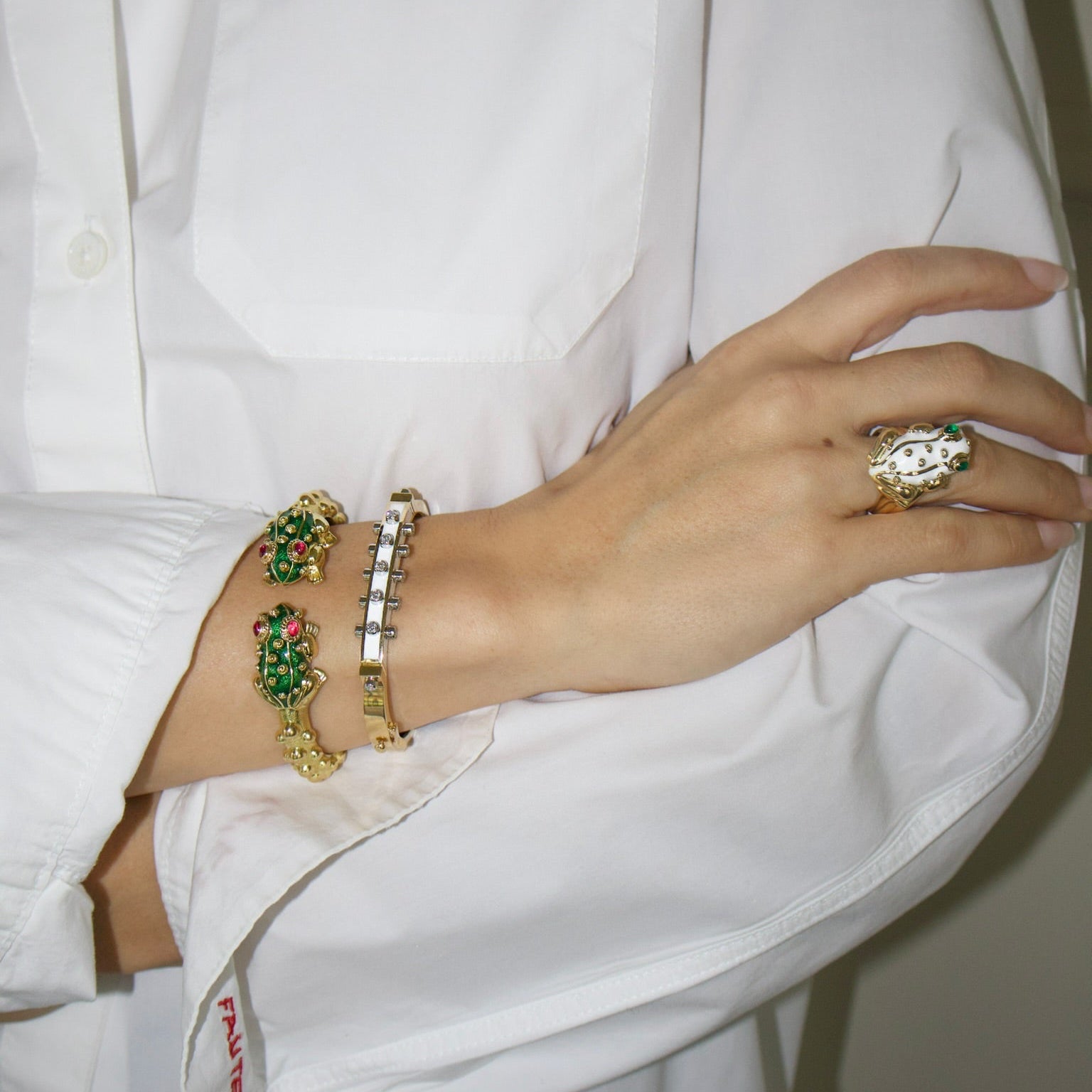 18k yellow gold green enamel baby frog bangle cuff bracelet with ruby eyes by David Webb Tiny Gods