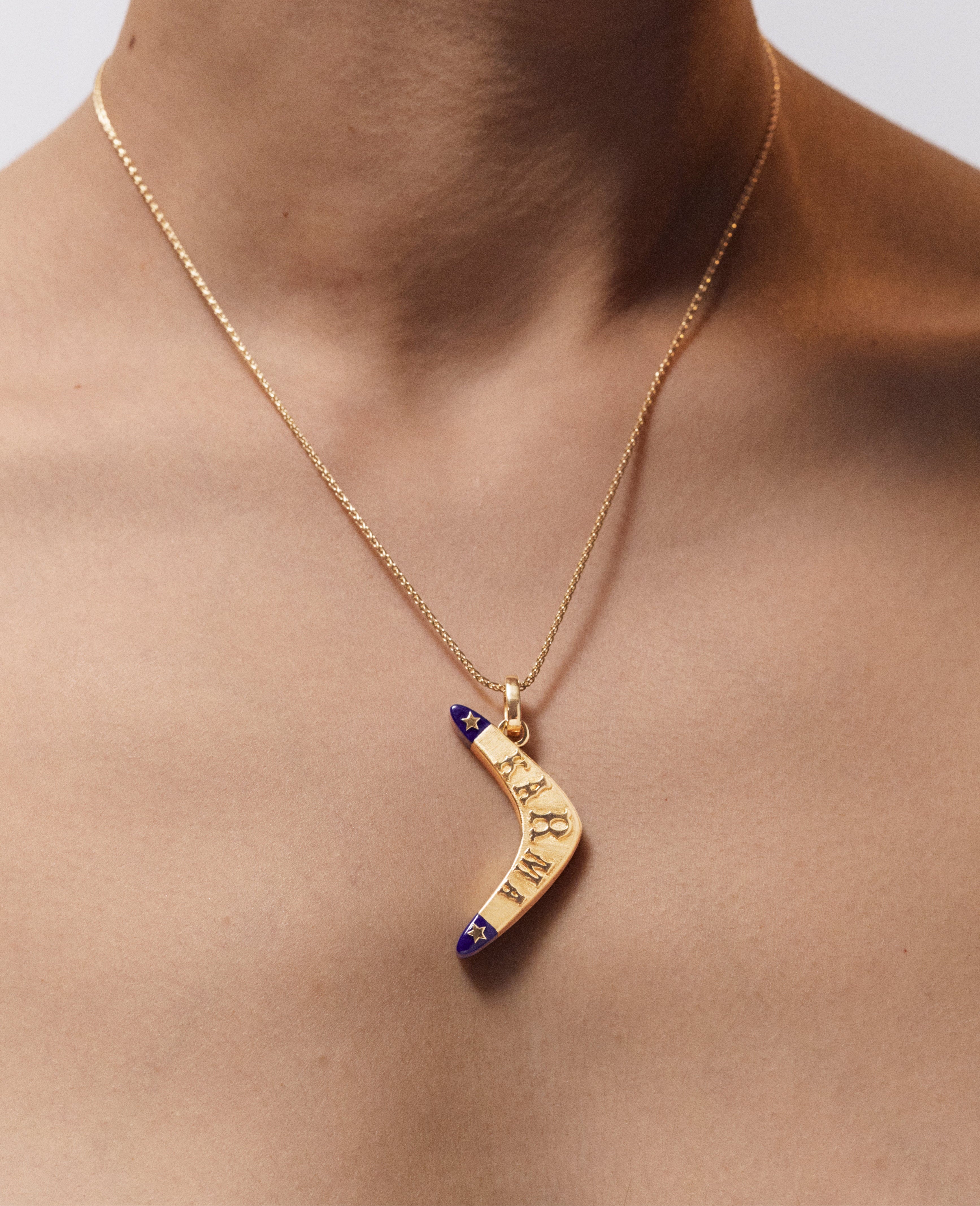 18k yellow gold and lapis karma boomerang pendant charm by Marie Lichtenberg Tiny Gods