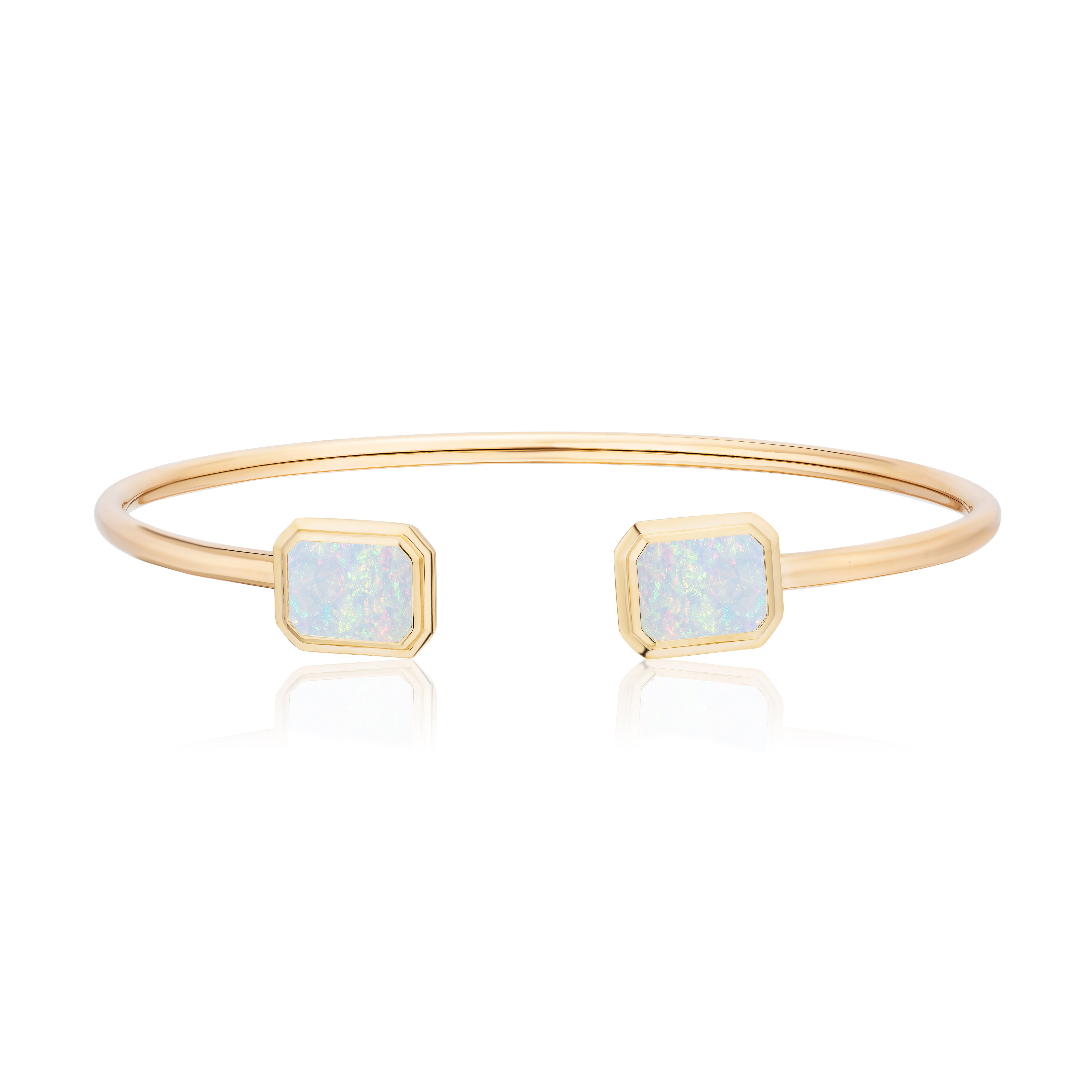18k yellow gold flexible tube open gap cuff bracelet with emerald cut opal by Goshwara Tiny Gods