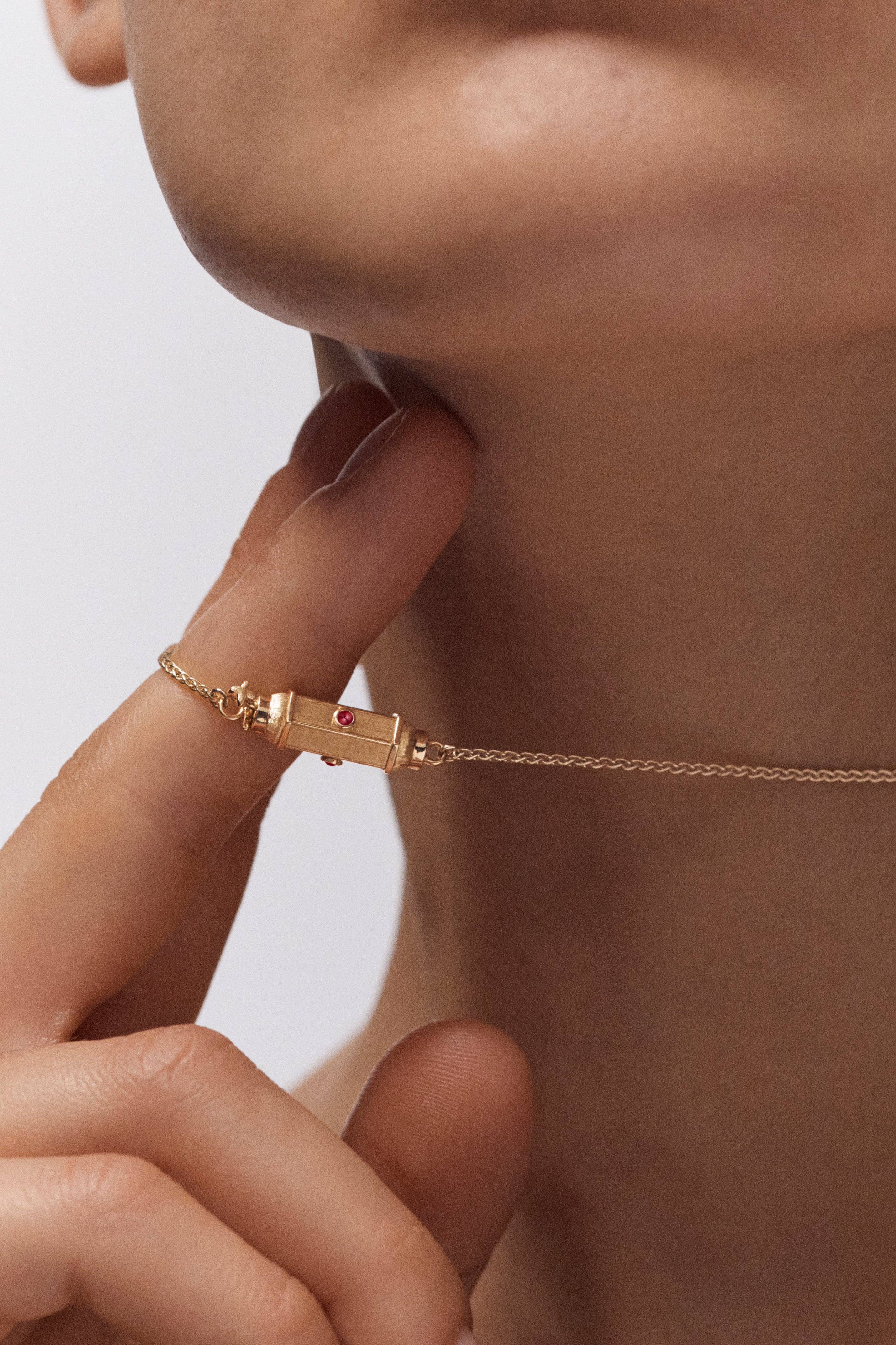 18k yellow gold re ruby micro coco locket necklace by Marie Lichtenberg Tiny Gods