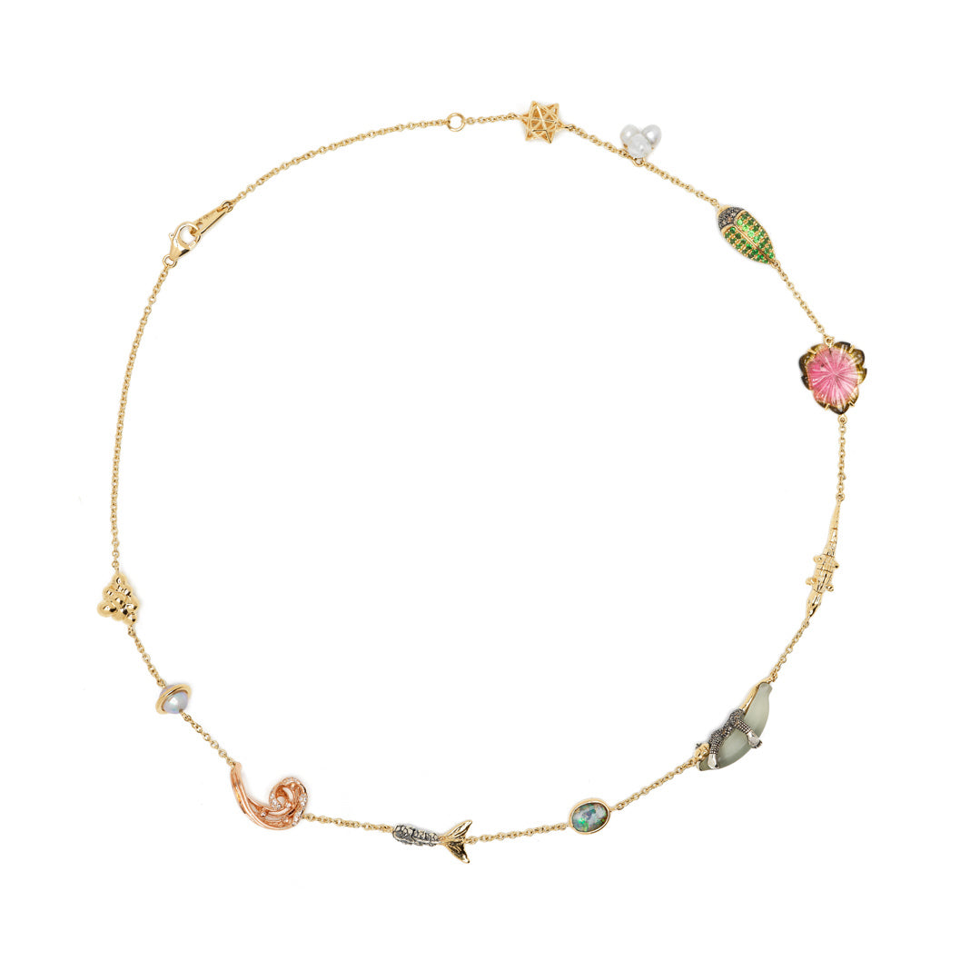 18k yellow gold trip down memory lane Bibi van der Velden necklace, mermaid tail, monkey on a banana, green scarab and alligator bite motif Tiny Gods