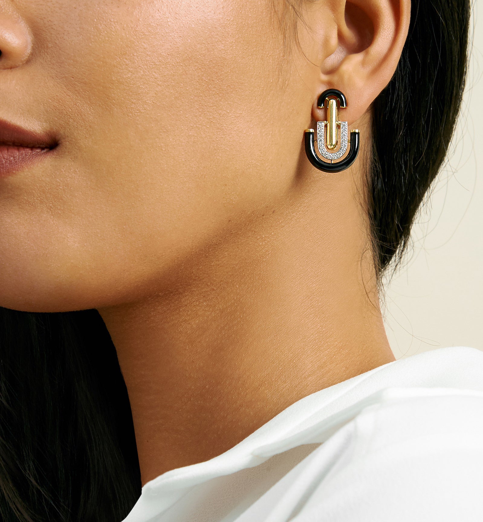 18k yellow gold and platinum unity earrings with diamonds and black enamel by David Webb Tiny Gods