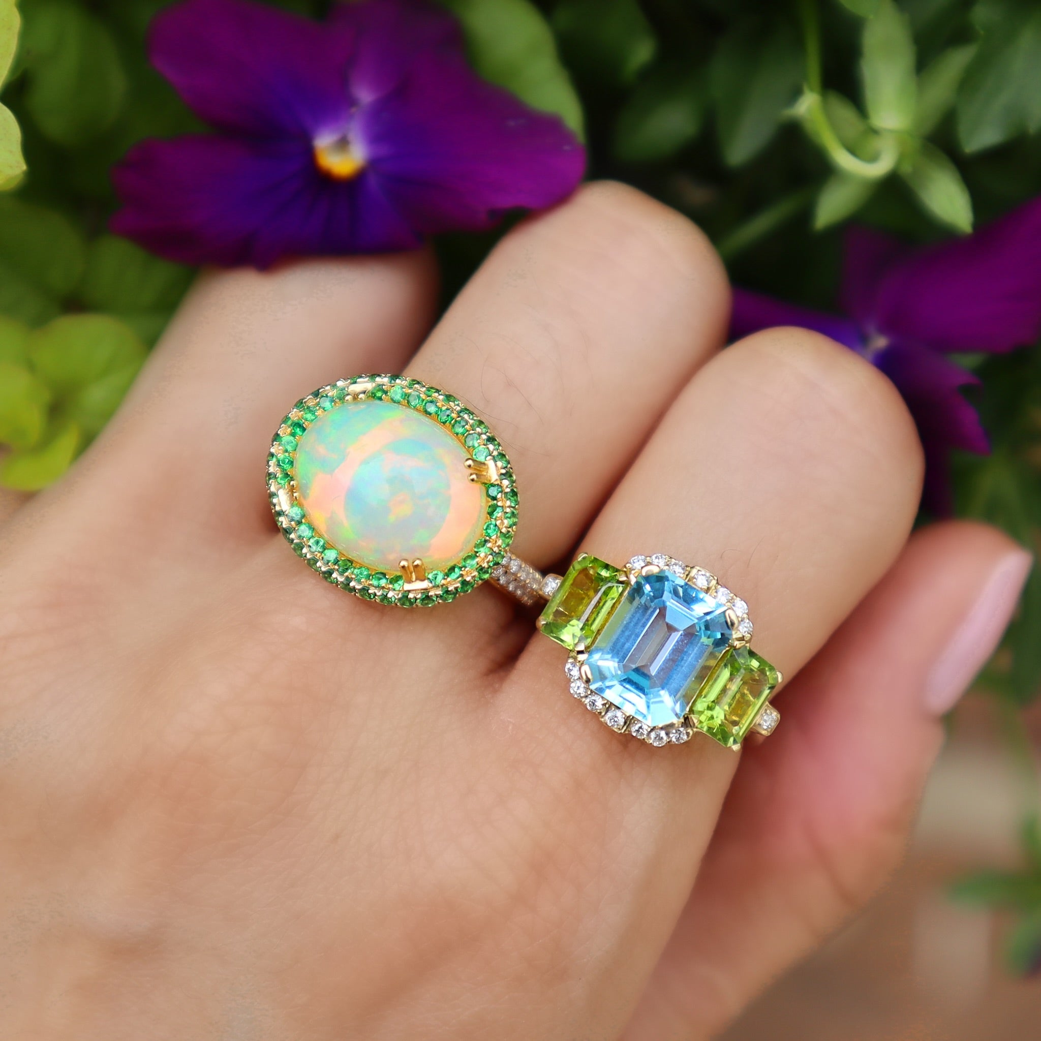 Diamond 'Gossip' Blue Topaz and Peridot Ring by Goshwara. 18k yellow gold and diamonds on model hand