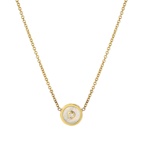 18k yellow gold mini compass pendant with white mother of pearl and diamond by Retrouvai