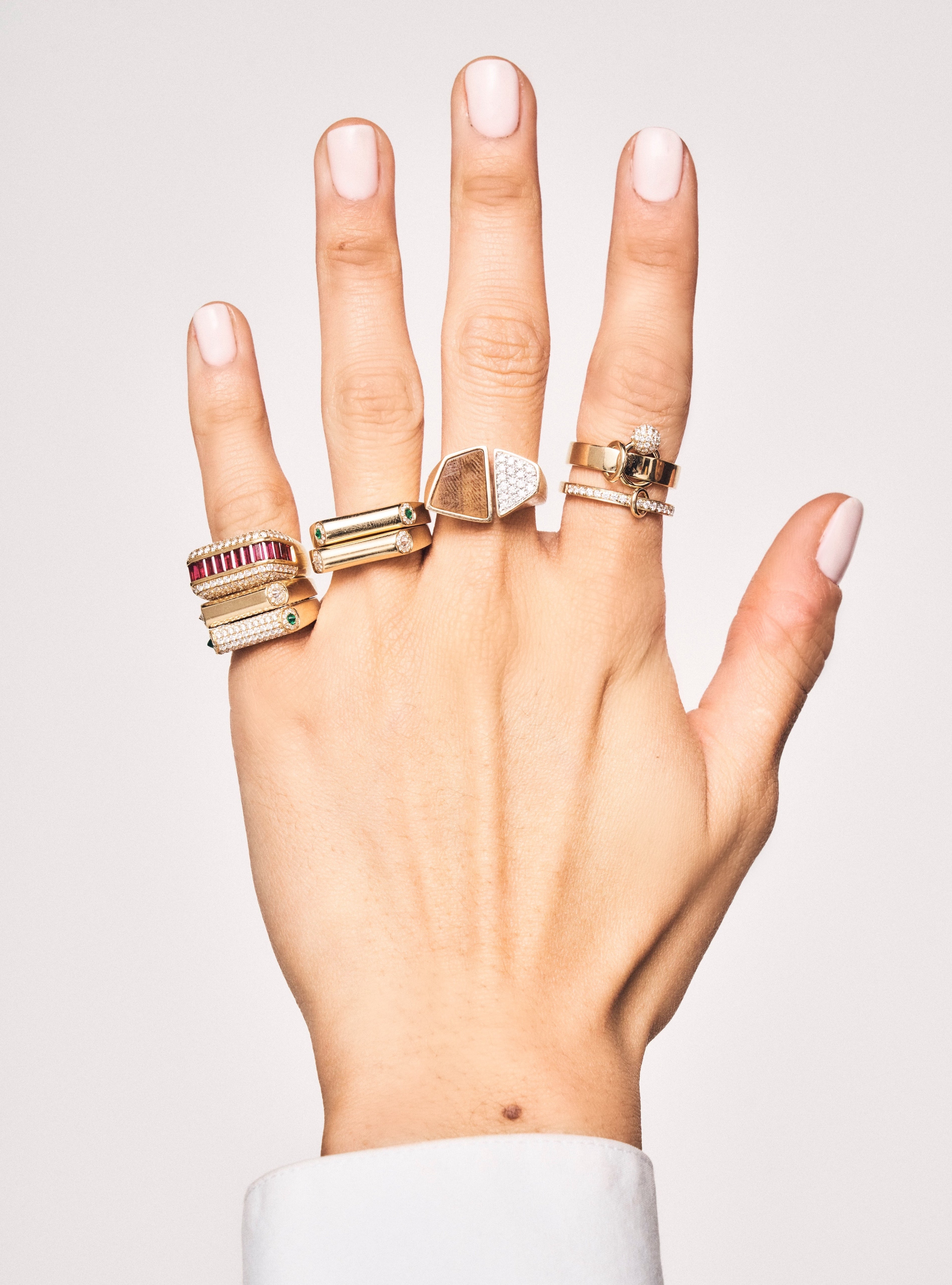 yellow gold emerald diamond ruby tigers eye rings by rainbow k tiny gods on model
