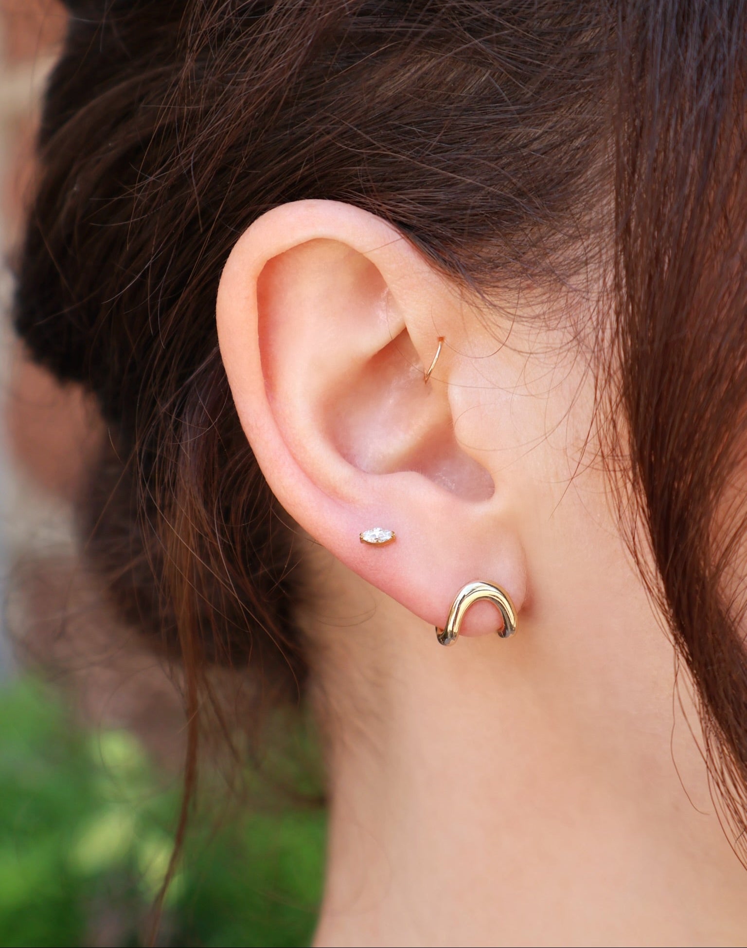 14k yellow gold slim gold huggie earrings by Zahn Z Tiny Gods 