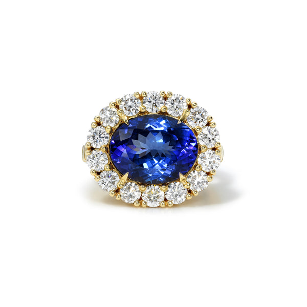 18k yellow gold one of a kind oval Tanzanite and Halo Diamond Heirloom Bezel Ring by Retrouvai at tiny gods