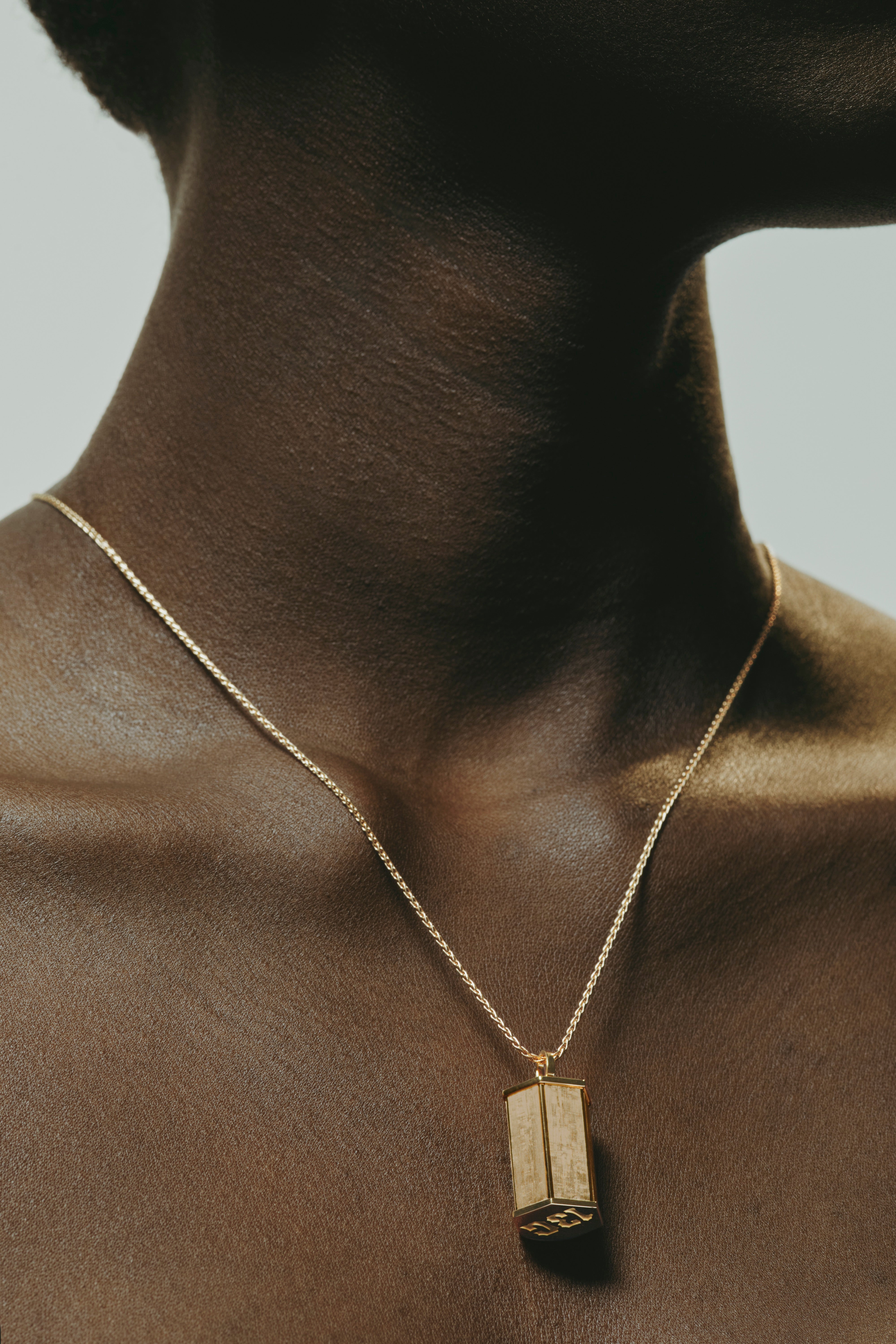 18k yellow gold jumbo weight pendant by Marie Lichtenberg Tiny Gods 