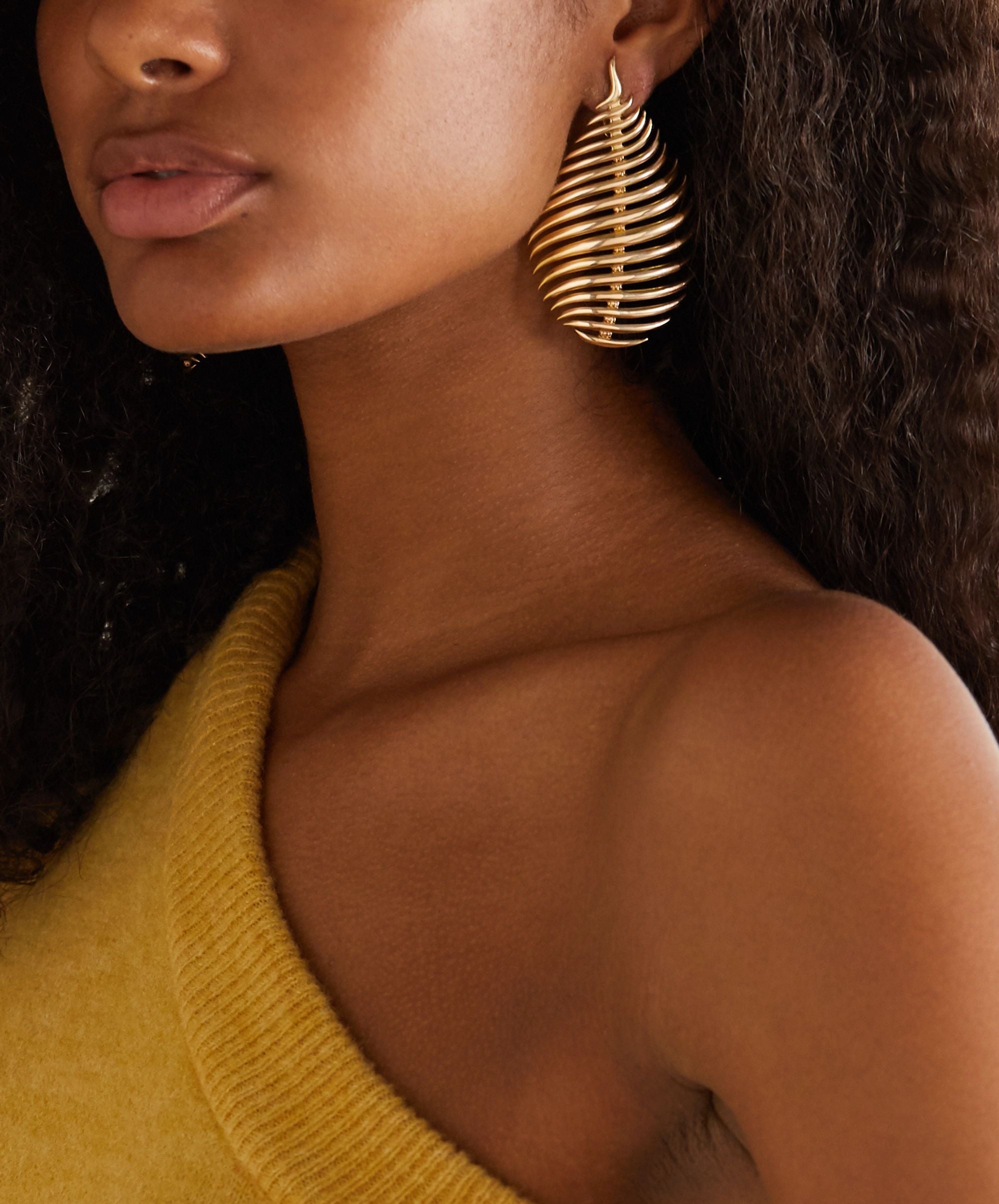 18k yellow gold large flame earrings by Fernando Jorge Tiny Gods 