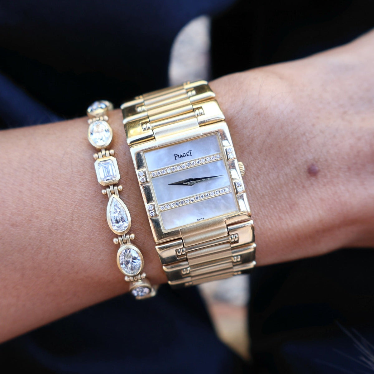 18k yellow gold mother of pearl and diamond Paiget dancer bracelet watch circa 1990's vintage Tiny Gods 