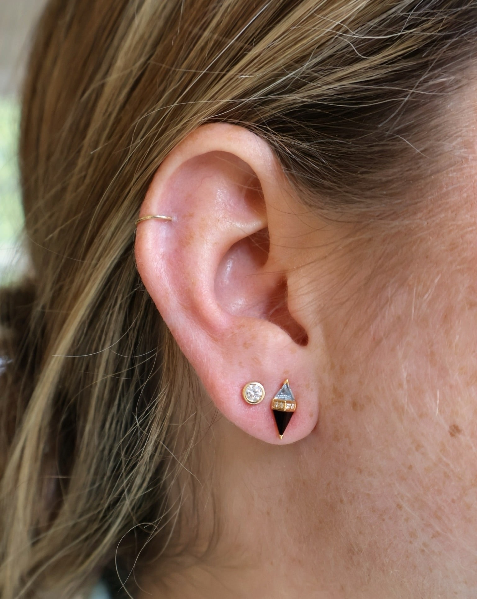 18K Yellow Gold Pietra studs featuring blue topaz, Black Onyx and Diamonds pietra studs by sorellina