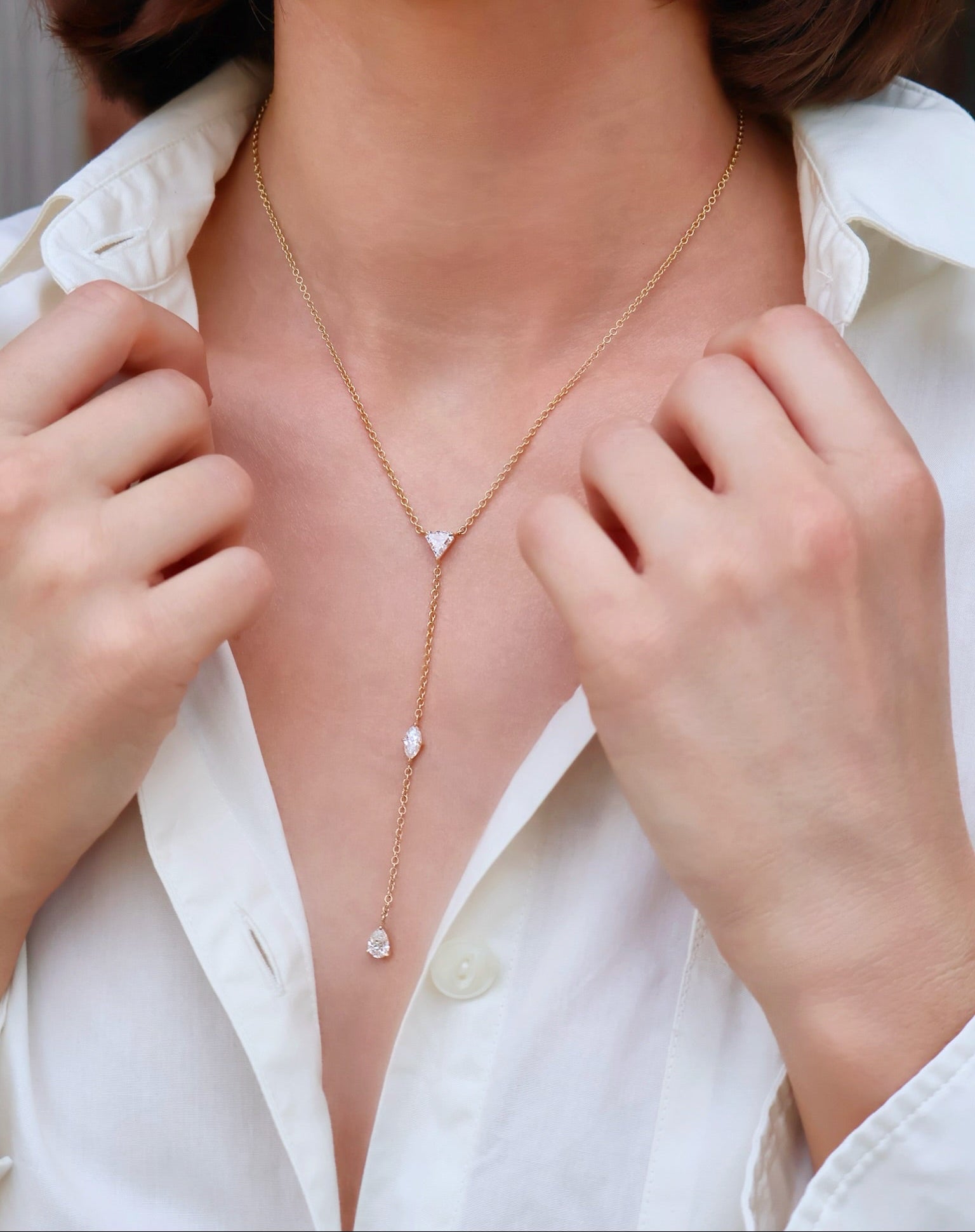 18k yellow gold shield, marquise and pear shaped prong set diamond lariat drop necklace by Tiny Gods 