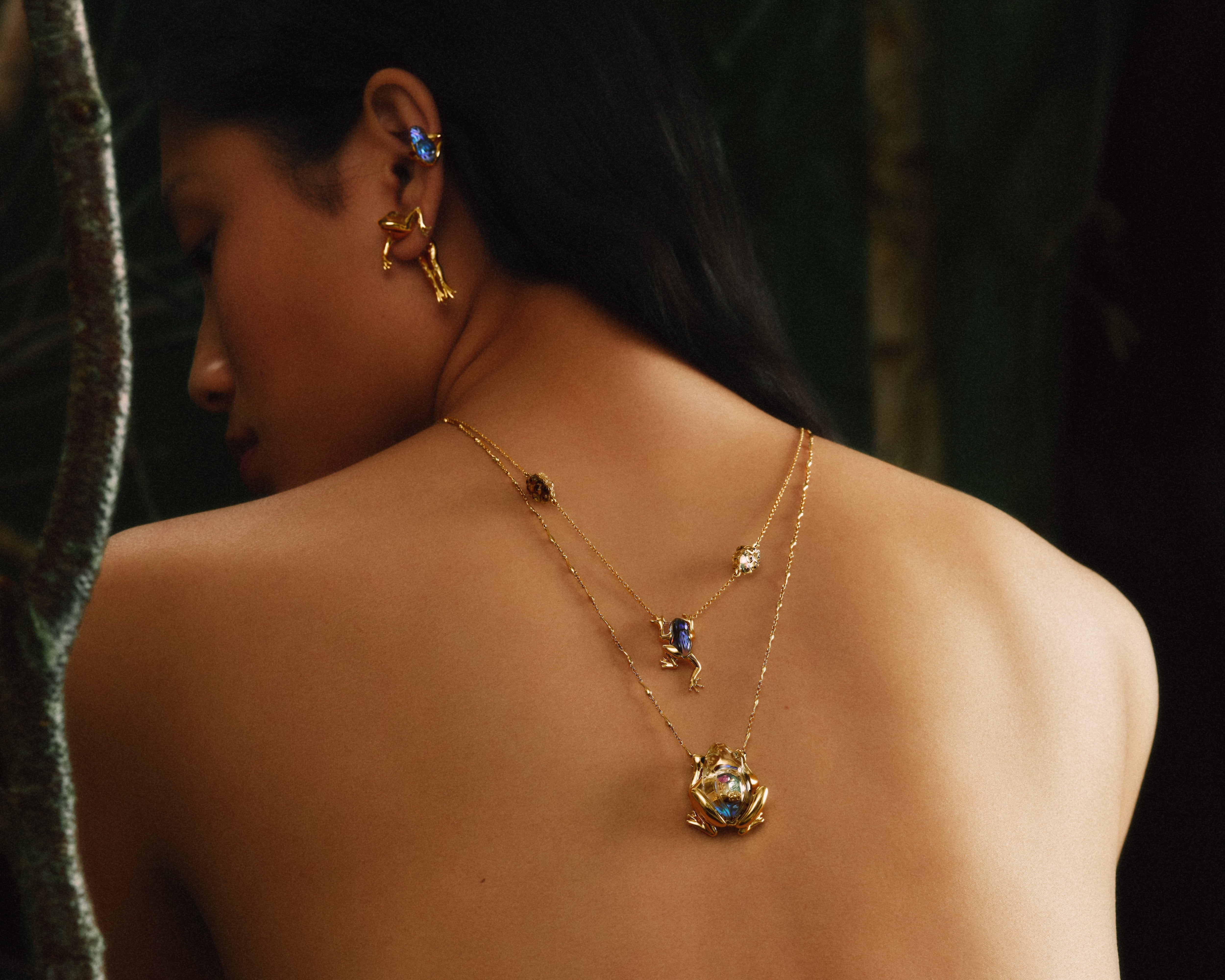 18k yellow gold carved white quartz abalone frog pendant with eggs on the chain by Bibi van der Velden tiny gods 