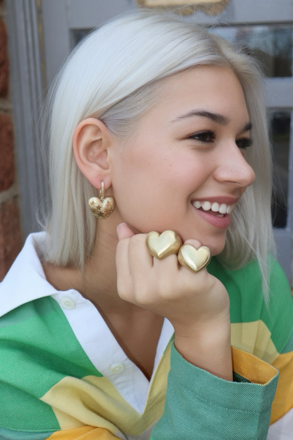 14k yellow gold paulette puff heart earrings with stars by Lauren Rubinski Tiny Gods on model