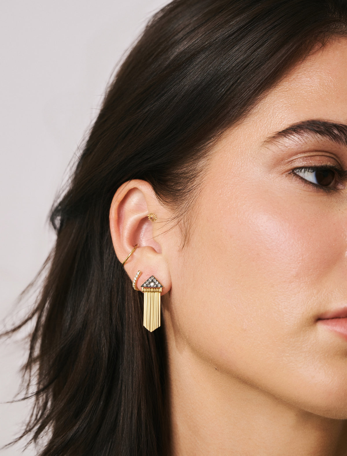 18k yellow gold oxidized diamond fringe sima earrings by Sylva Cie Tiny Gods on model
