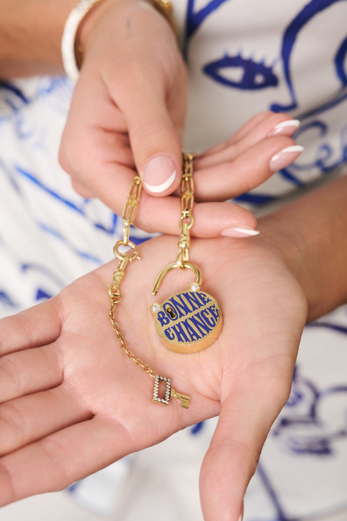 18k yellow gold diamond bonne chance luck padlock key and lock charm by Circa 1700 Tiny Gods in hand