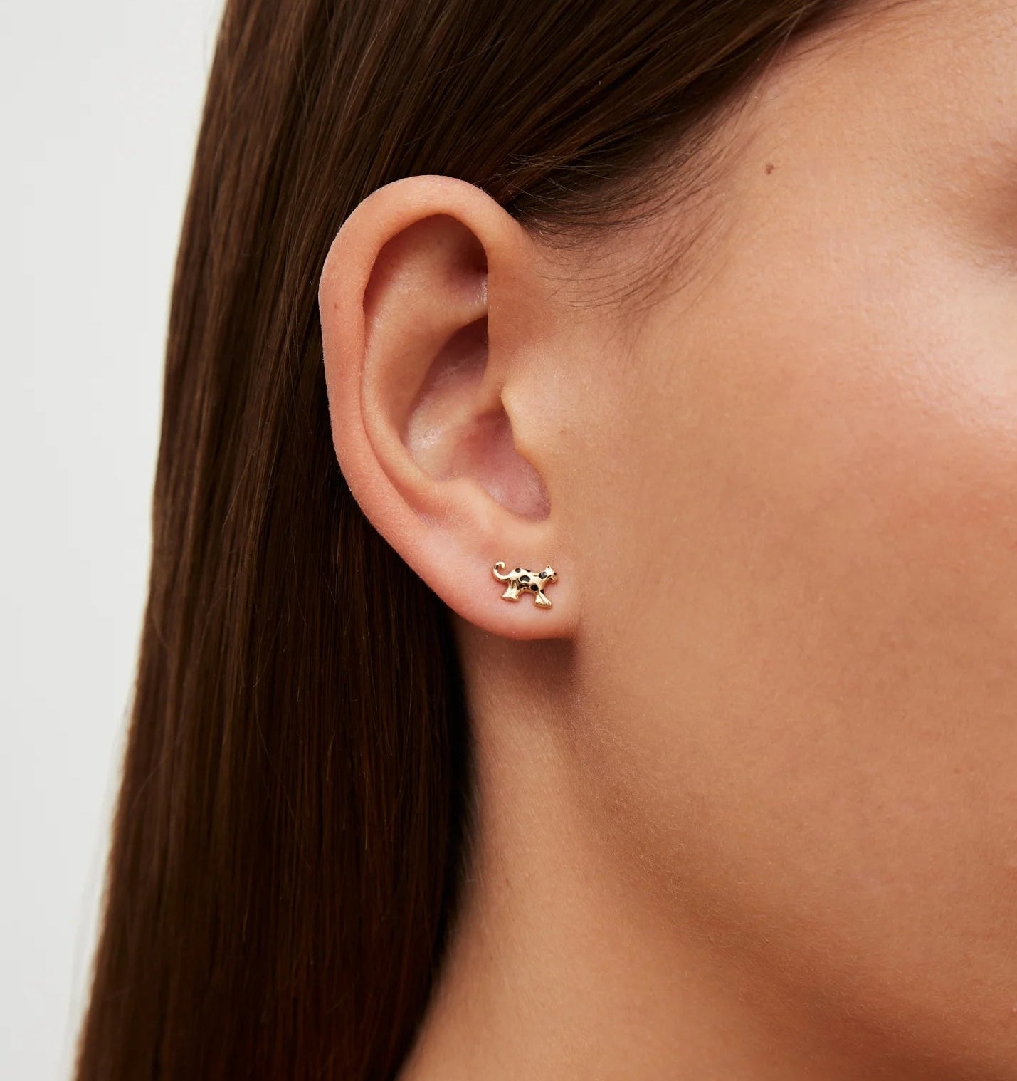 9k yellow gold and black enamel leopard stud earring by Yvonne Leon Tiny Gods 