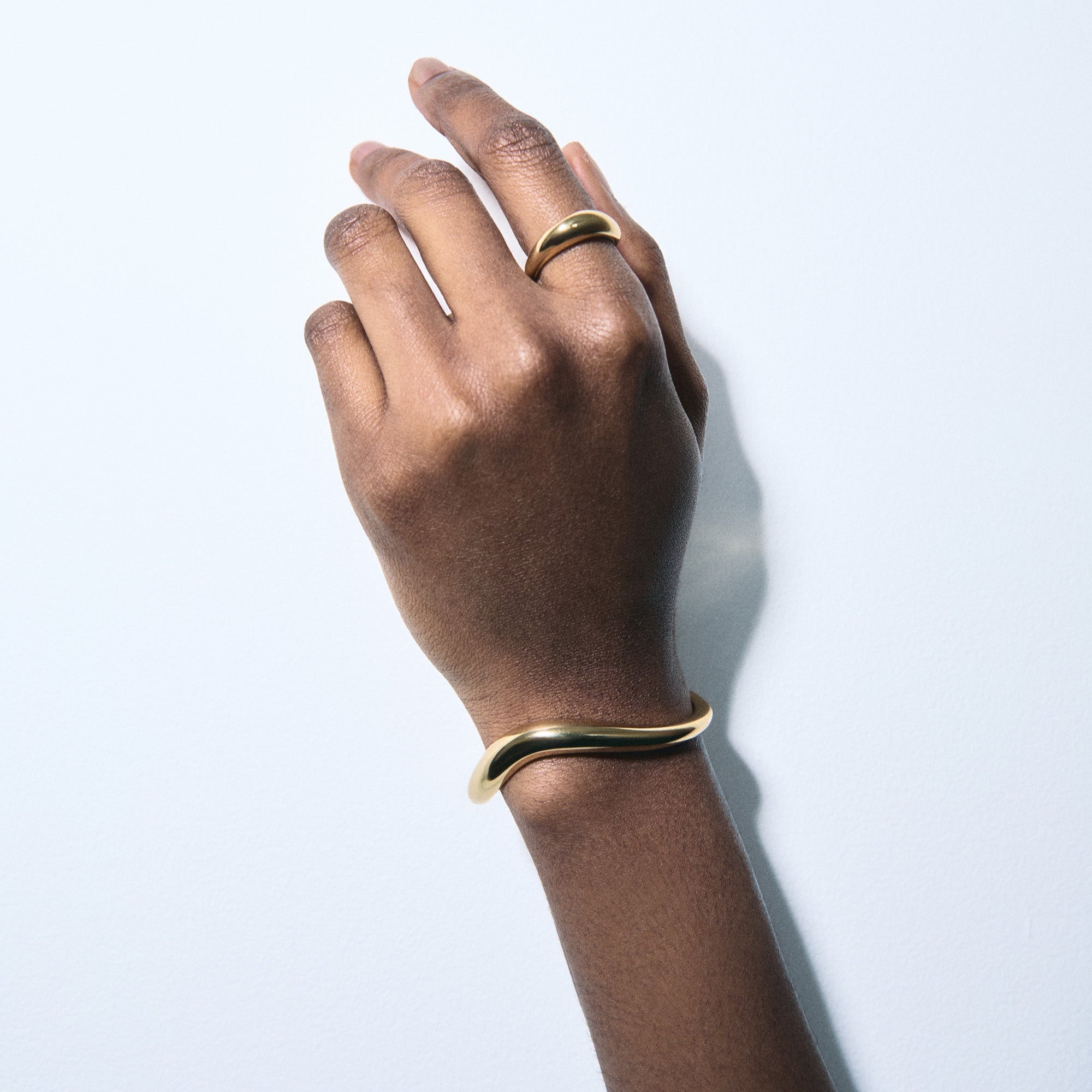 18k yellow gold bold stream wave bracelet by Fernando Jorge Tiny Gods