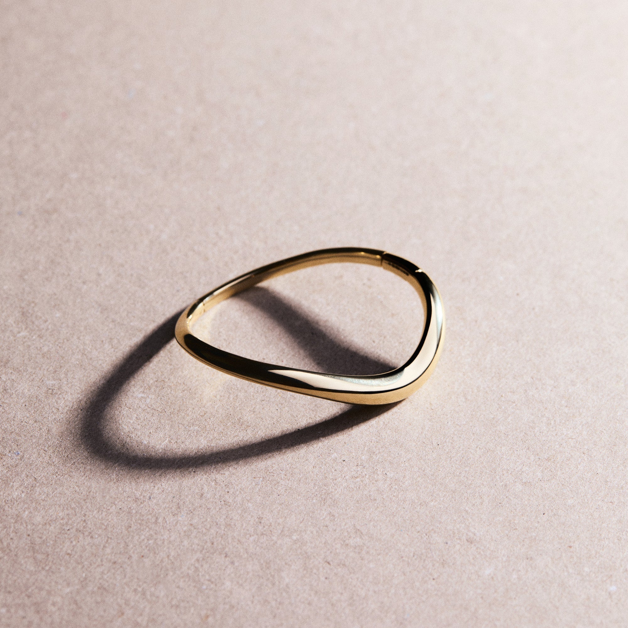 18k yellow gold bold stream wave bracelet by Fernando Jorge Tiny Gods
