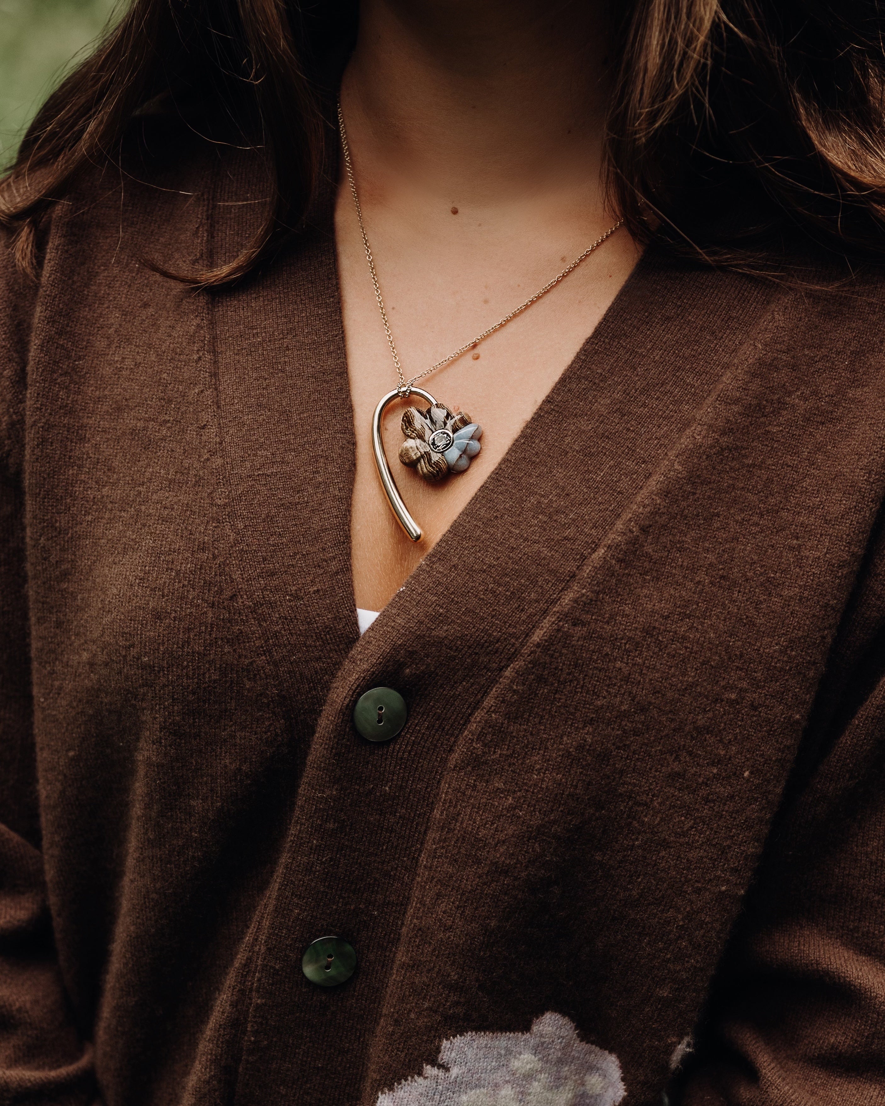 Large Wood & Chalcedony Bond Flower with Sapphire 14k yellow gold retrouvai daisy charm necklace pendant at tiny gods on model